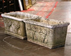 Pair of 19th Century French Weathered Carved Stone Outdoor Planters with Grapes