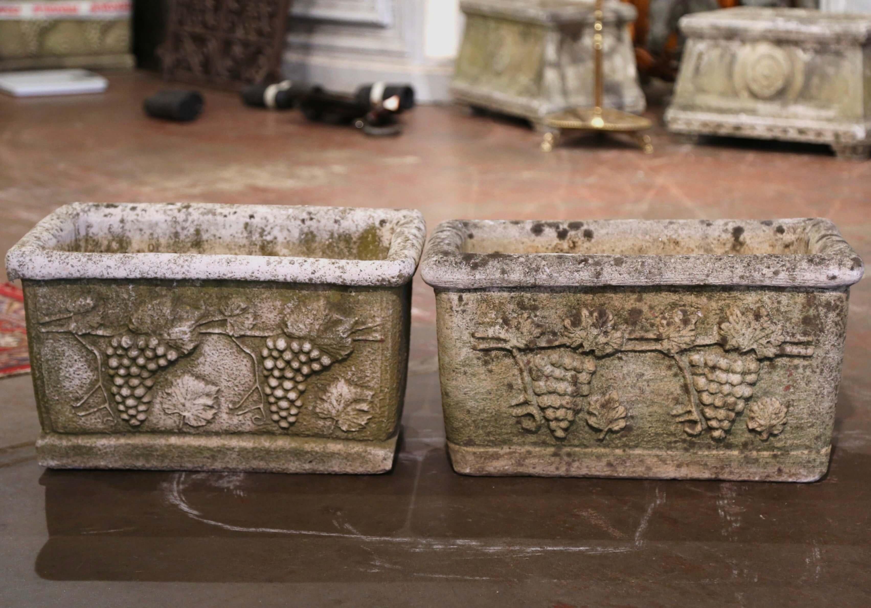 Hand-Carved Pair of 19th Century French Weathered Carved Stone Outdoor Planters with Grapes