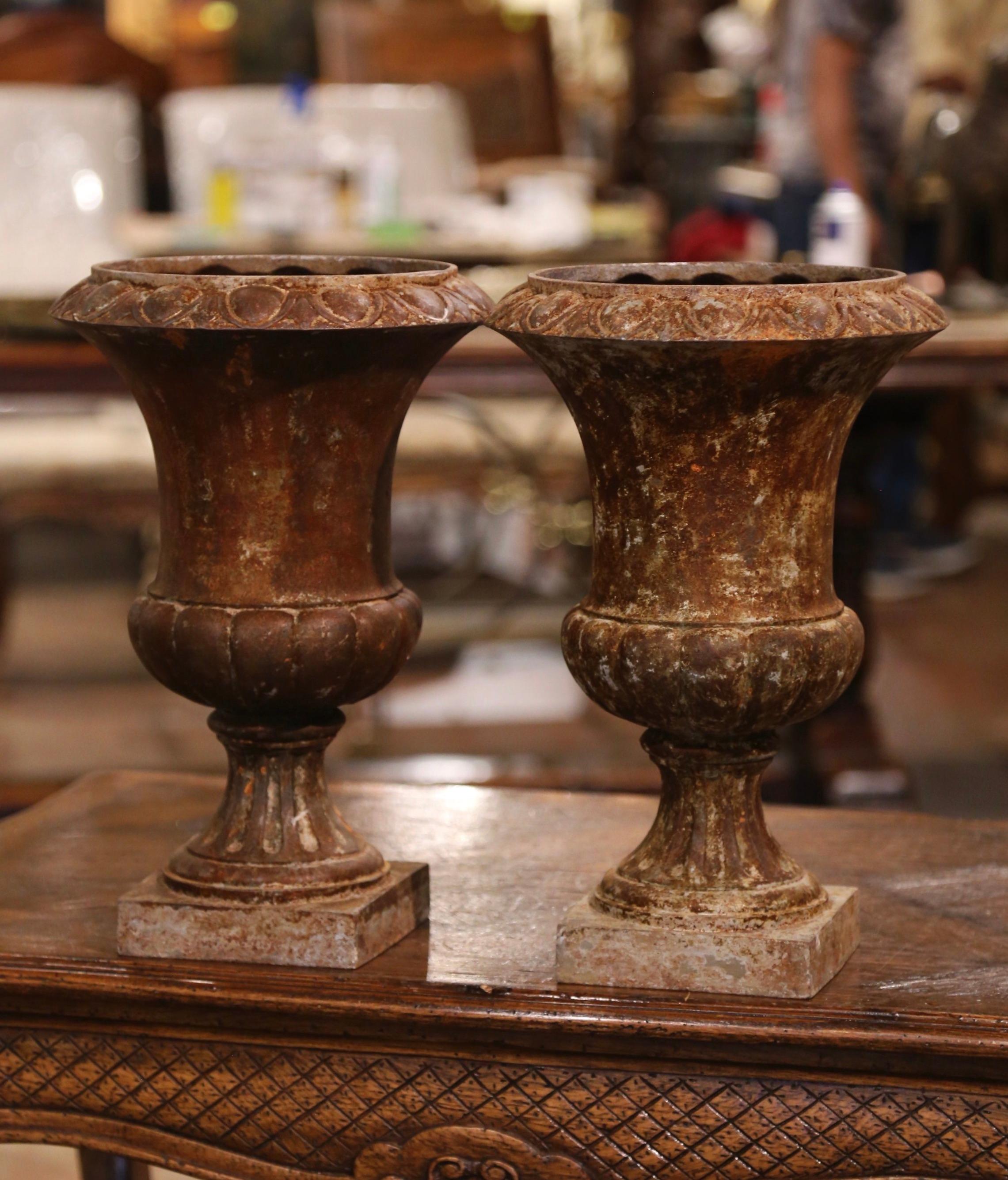 Patinated Pair of 19th Century French Weathered Iron Campana Form Garden Urns For Sale
