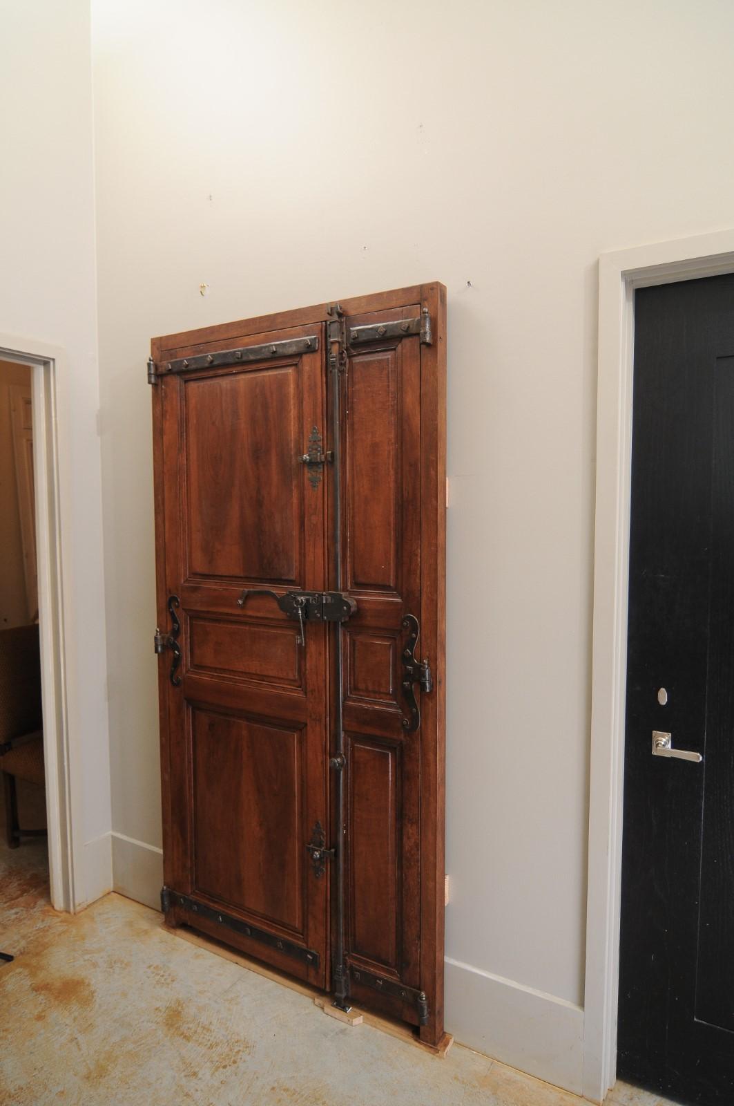 Pair of 19th Century French Wooden Communication Doors with Iron Hardware In Good Condition In Atlanta, GA