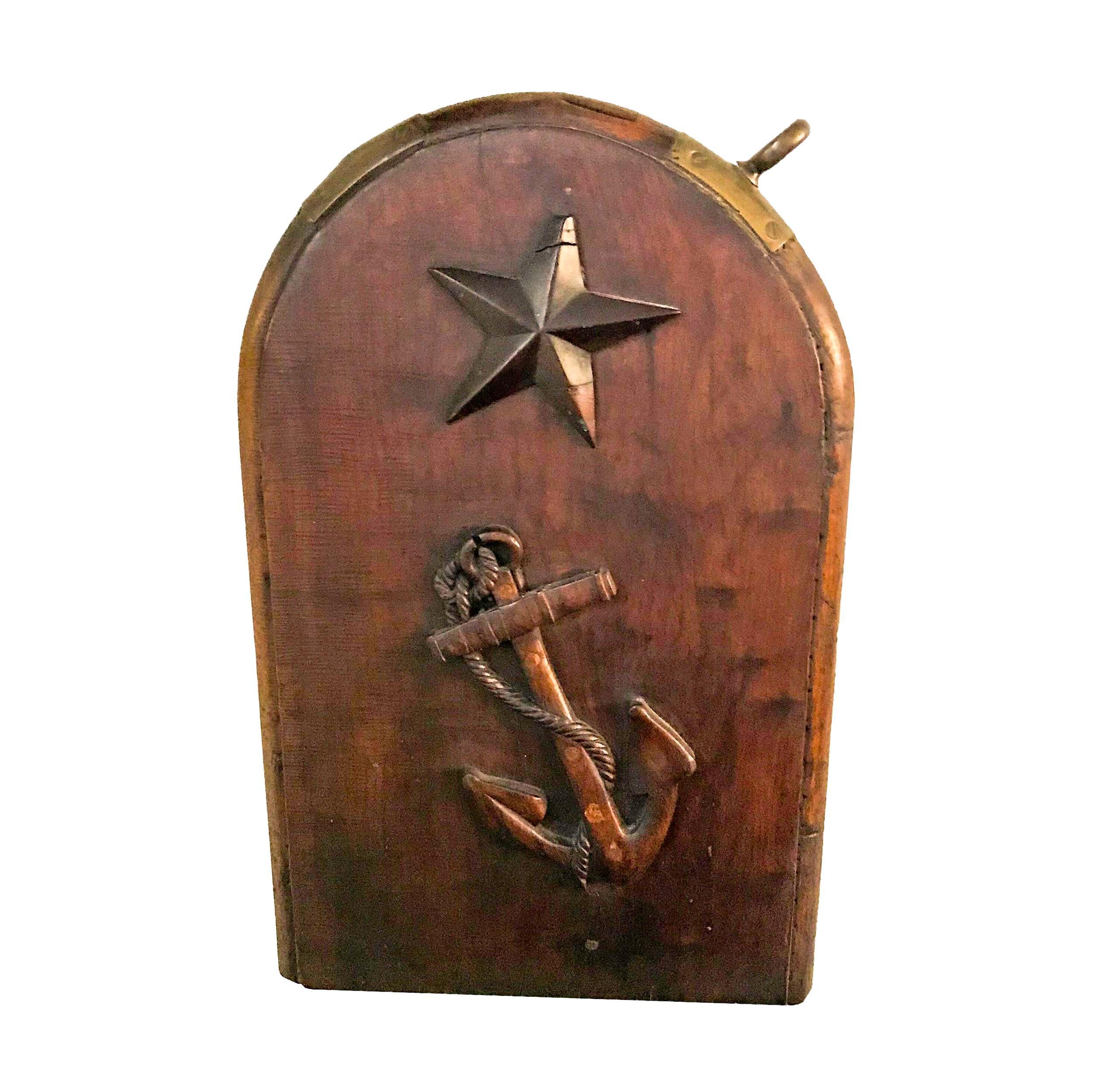 Made of walnut and having their original brass mounts and suspension rings, each having applied carvings of stars and fouled anchors. Old minor repairs to some of the sides, American, circa 1840-1860.
Measures: 33” x 21” x 3 ¾”.
 