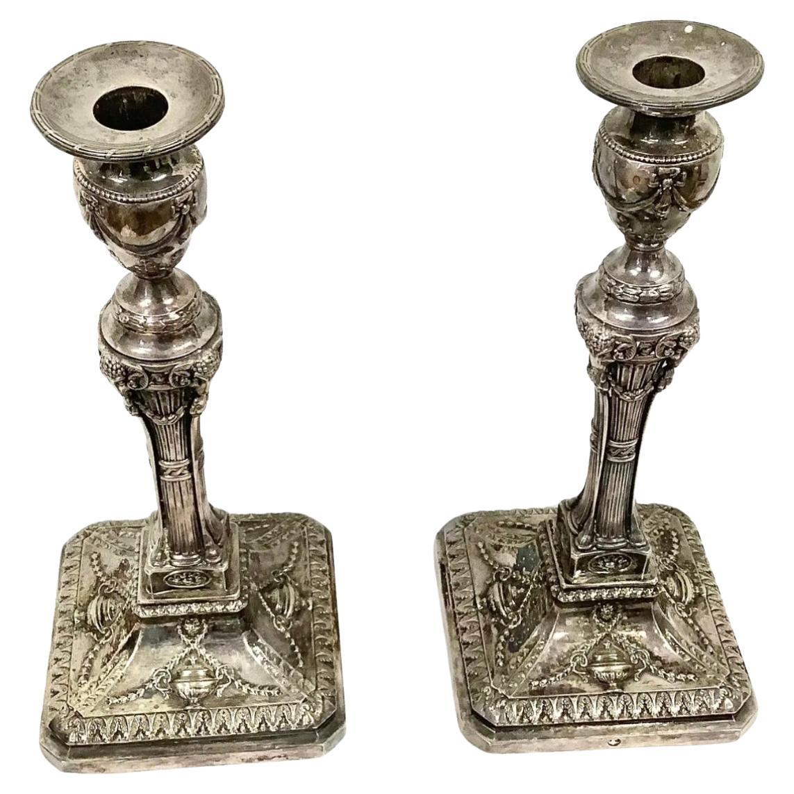 Early 19th century Georgian silver plated candlesticks. Beautiful ornate design . Very good condition.