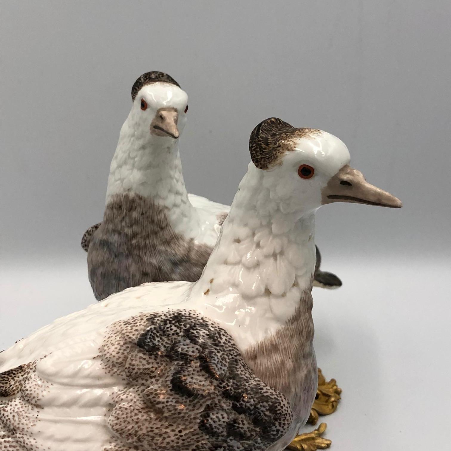 Pair of mid-19th century Samson Porcelain birds each mounted on circular ormolu bases in the Rococo manner. French circa 1850.