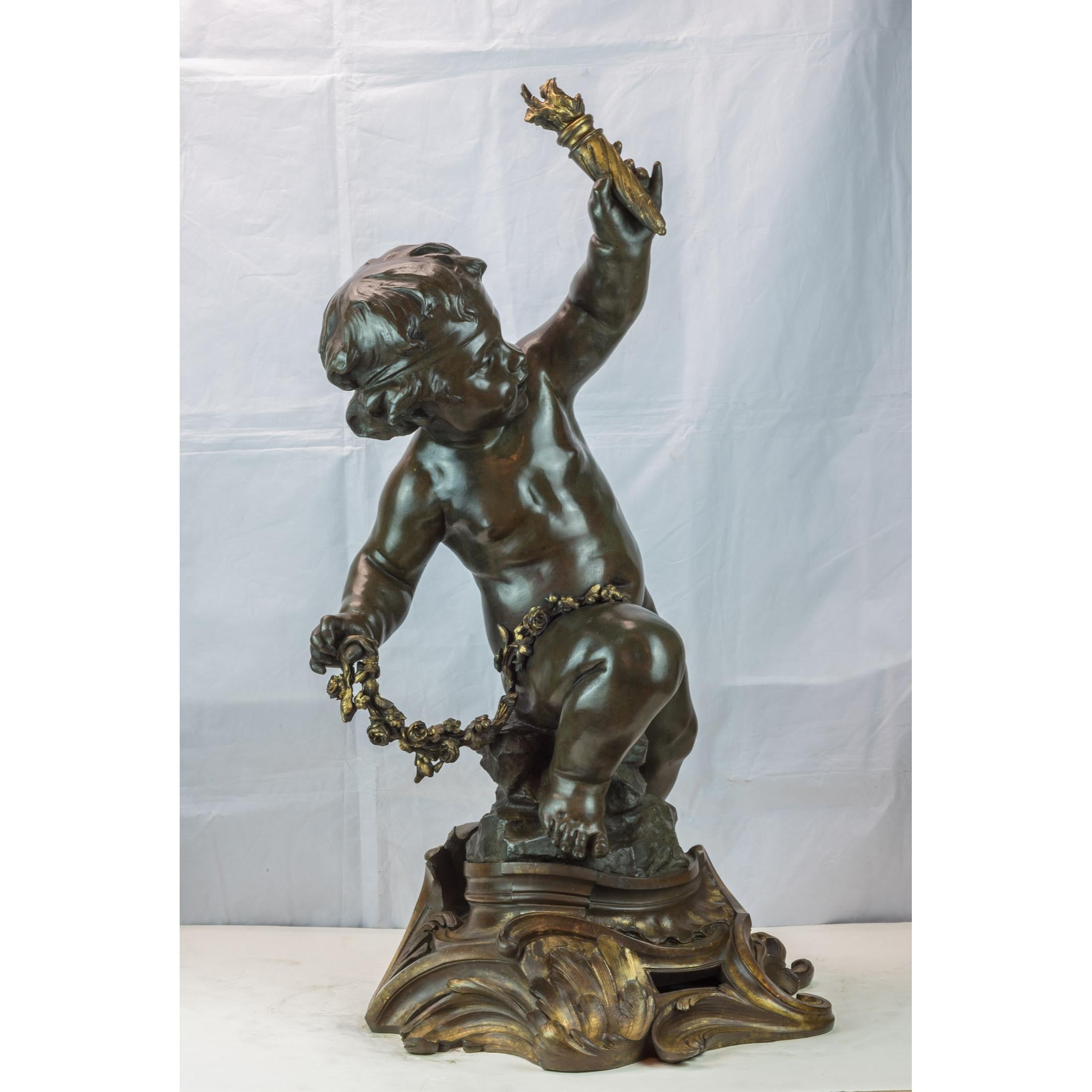 A monumental pair of gilt and patinated bronze figural sculptures of putti attributed H Nelson.
Depicting two finely casted seated cherub holding reliefs. 

Maker: attributed Alphonse H. Nelson (1854-1919)
Origin: French
Date: circa