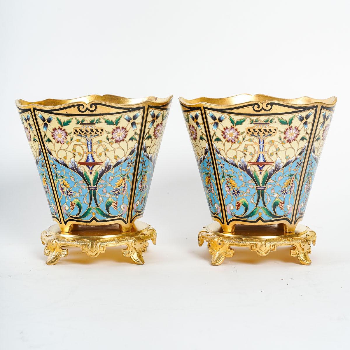 Pair of 19th Century Gilt Bronze and Cloisonné Cups.

Pair of 19th century gilt bronze and cloisonné bowls, Napoleon III period.

Dimensions: h: 13cm, d: 13cm