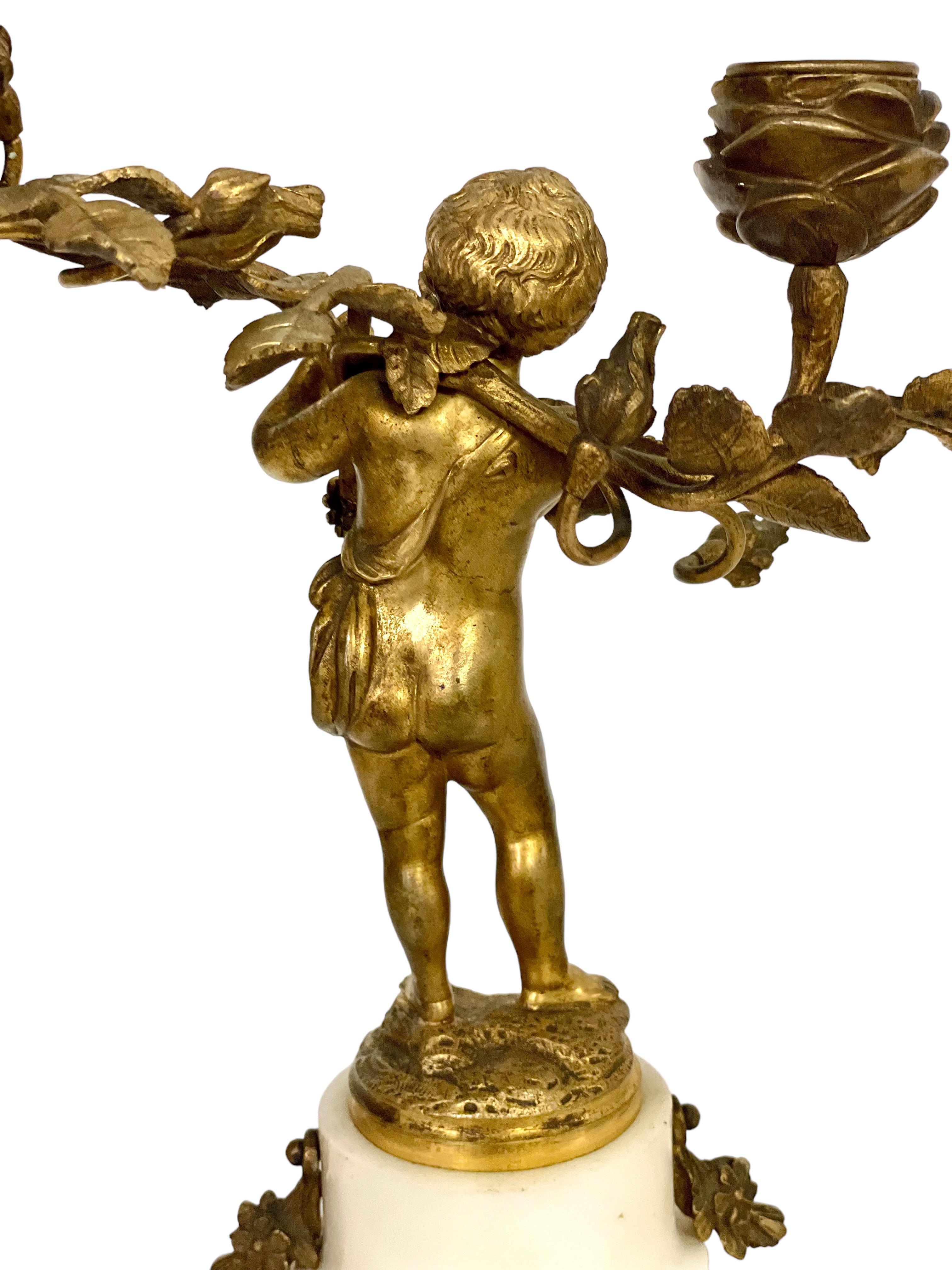 19th Century Pair of Gilt Bronze Cherubs Candelabra with Marble Stands In Good Condition For Sale In LA CIOTAT, FR