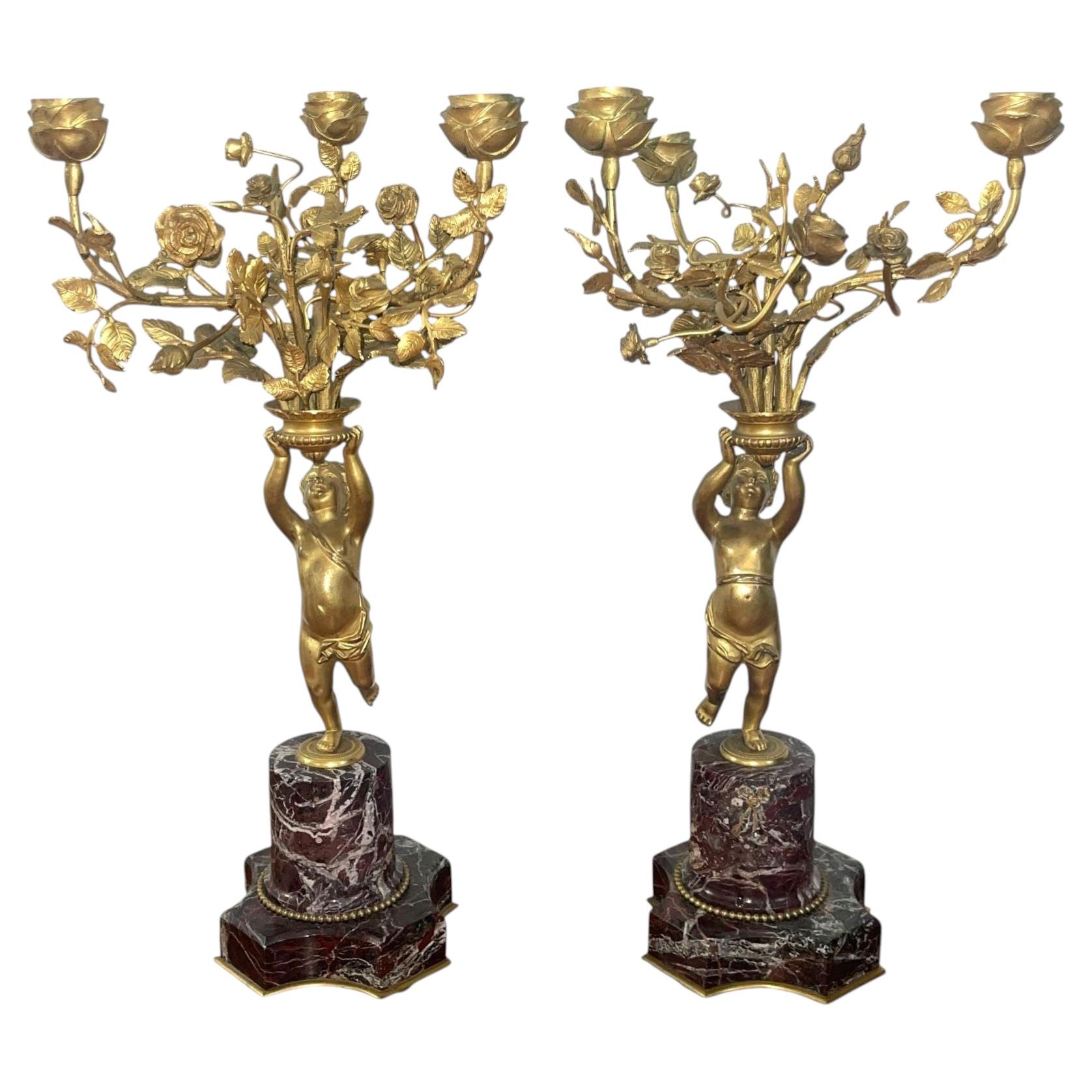 Pair of 19th Century Gilt Bronze Figural Putti Candelabras on Marble Base