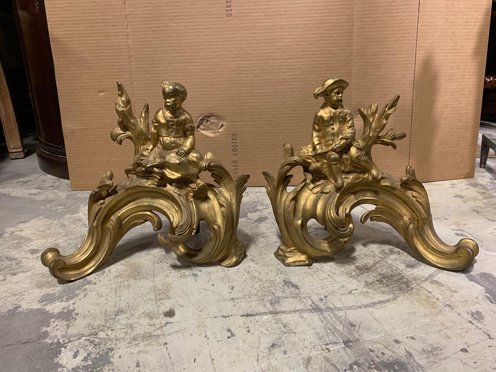 Pair of 19th century gilt bronze fireplace chenets with figures.