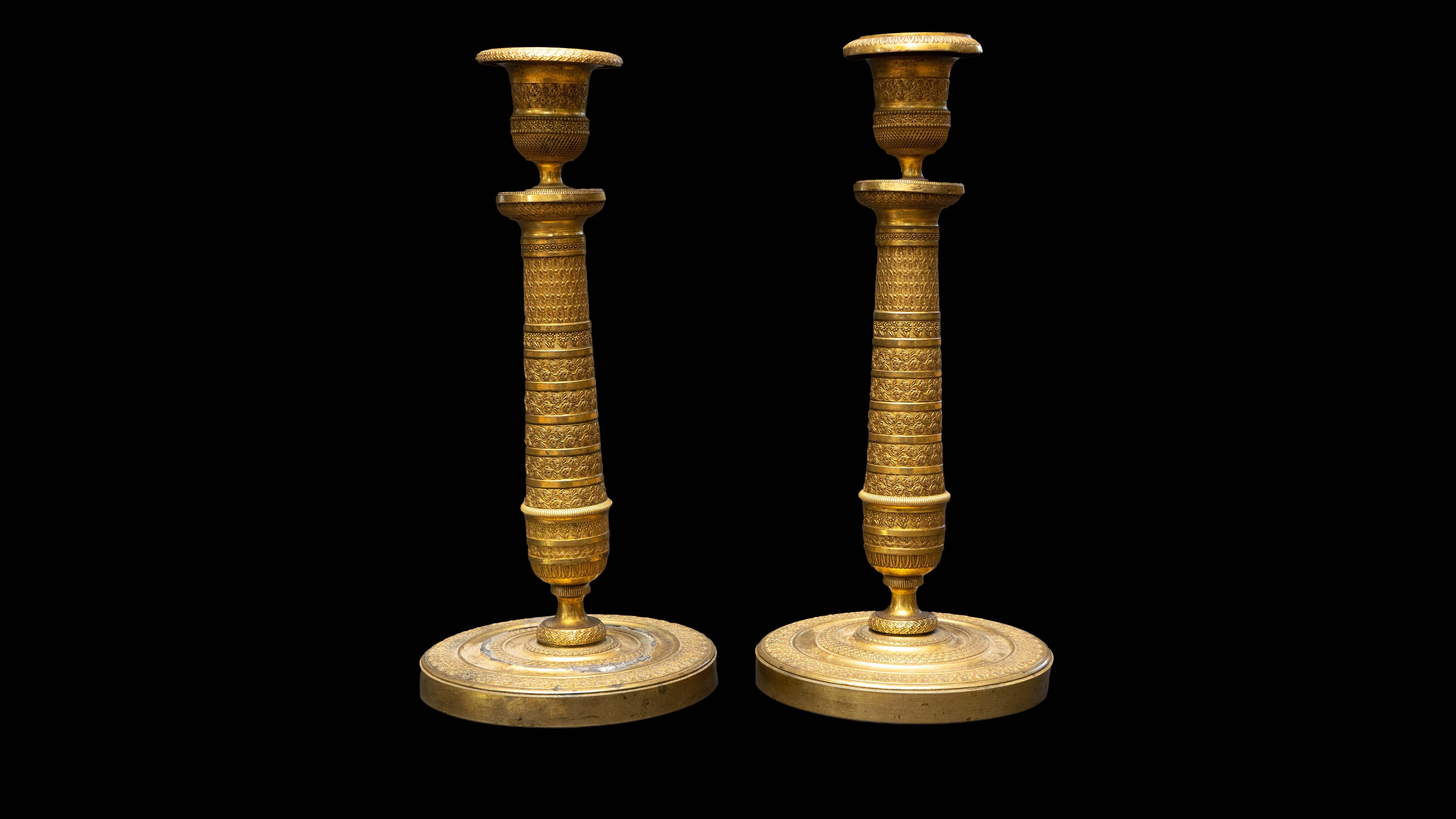 Pair of 19th century gilt candlesticks

Measures: 4.5