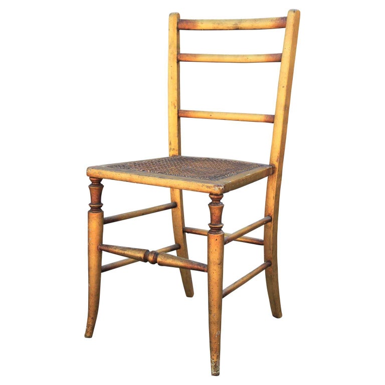 Hollywood Regency Pair of 19th Century Gilt Cane Side Ladder Back Chairs For Sale