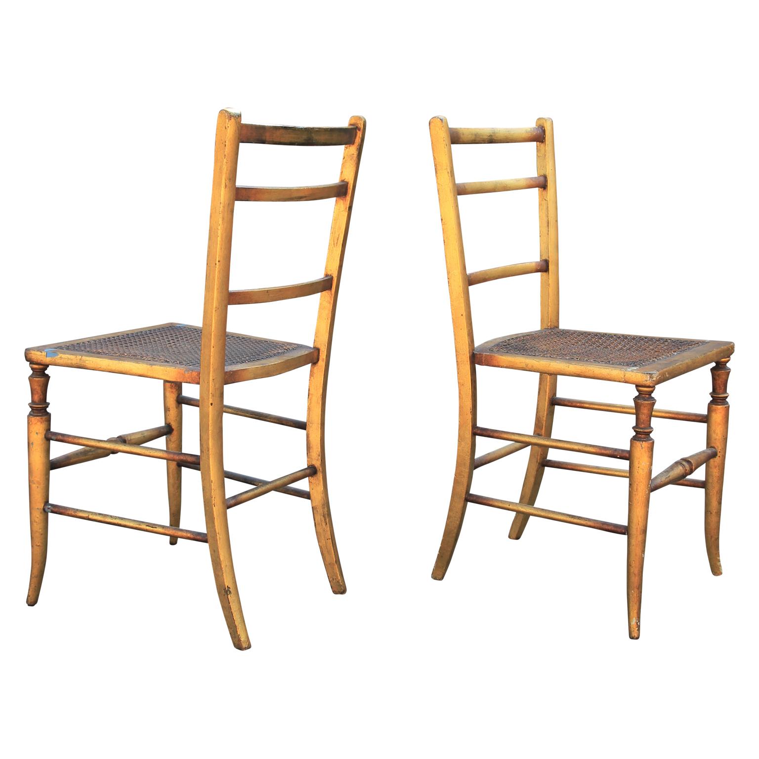 Hollywood Regency Pair of 19th Century Gilt Cane Side Ladder Back Chairs