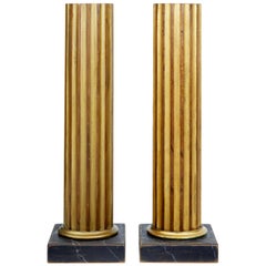 Paire de piédestaux à colonnes dorées du 19ème siècle
