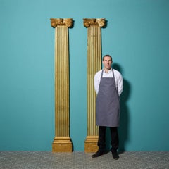 Paire de colonnes pilastres ioniques dorées de style néoclassique du 19e siècle