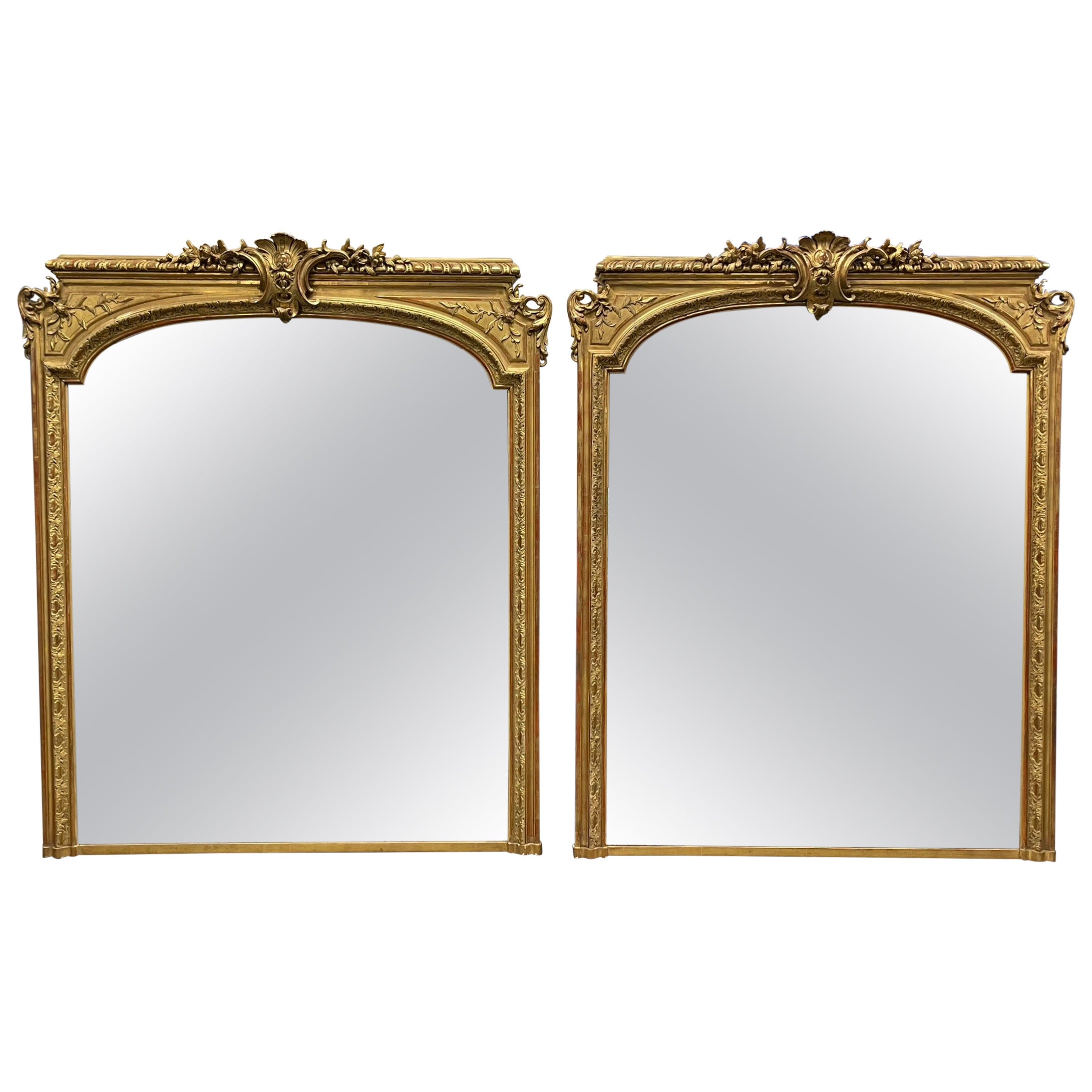 Pair of 19th Century Gilt overmantel mirrors with original plate mirrors
