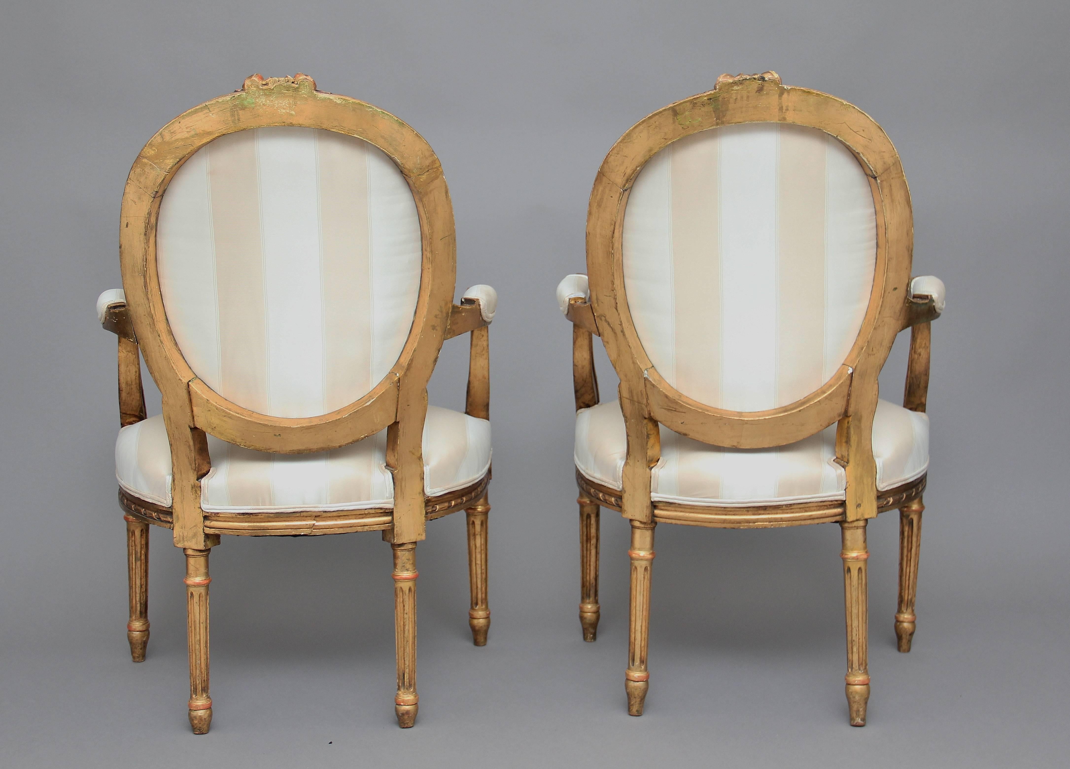 French Pair of 19th Century Giltwood and Carved Armchairs