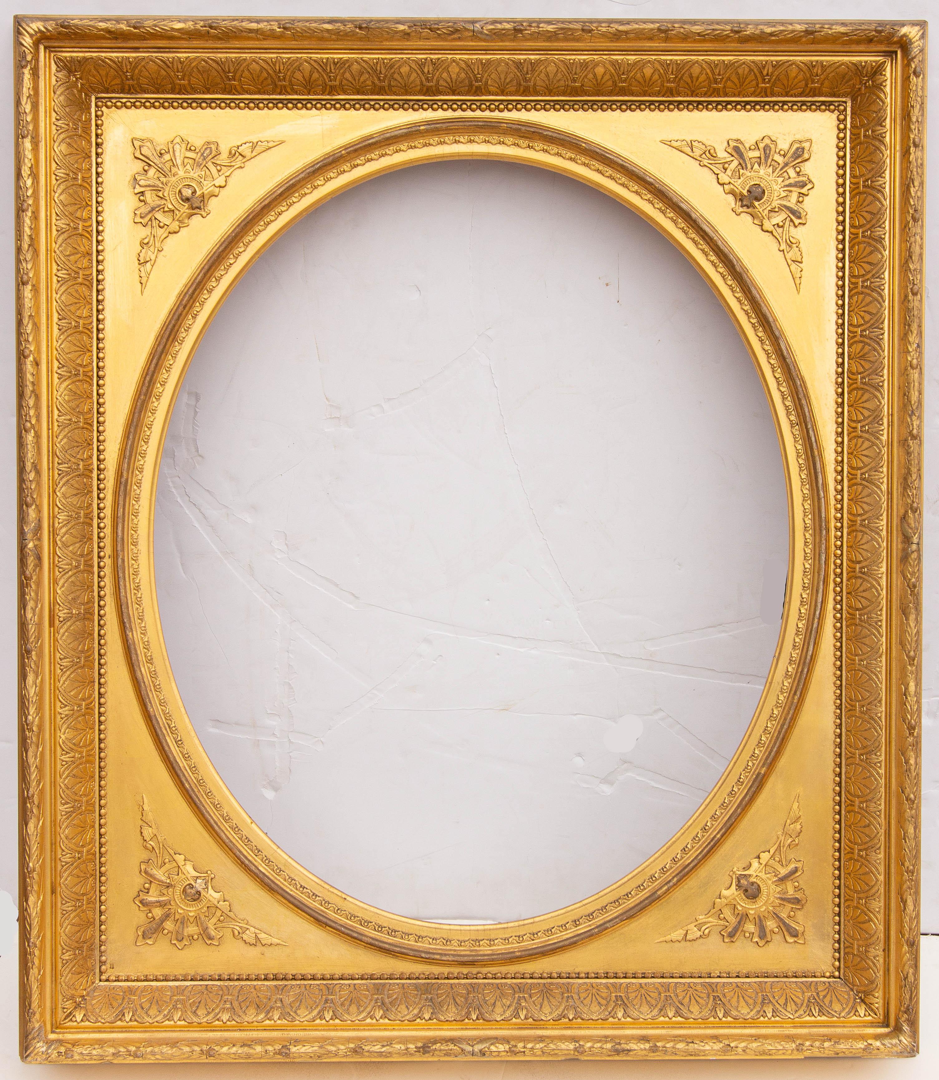 Pair of American antique giltwood mirrors.