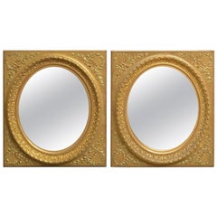 Paire de miroirs muraux en bois doré du XIXe siècle