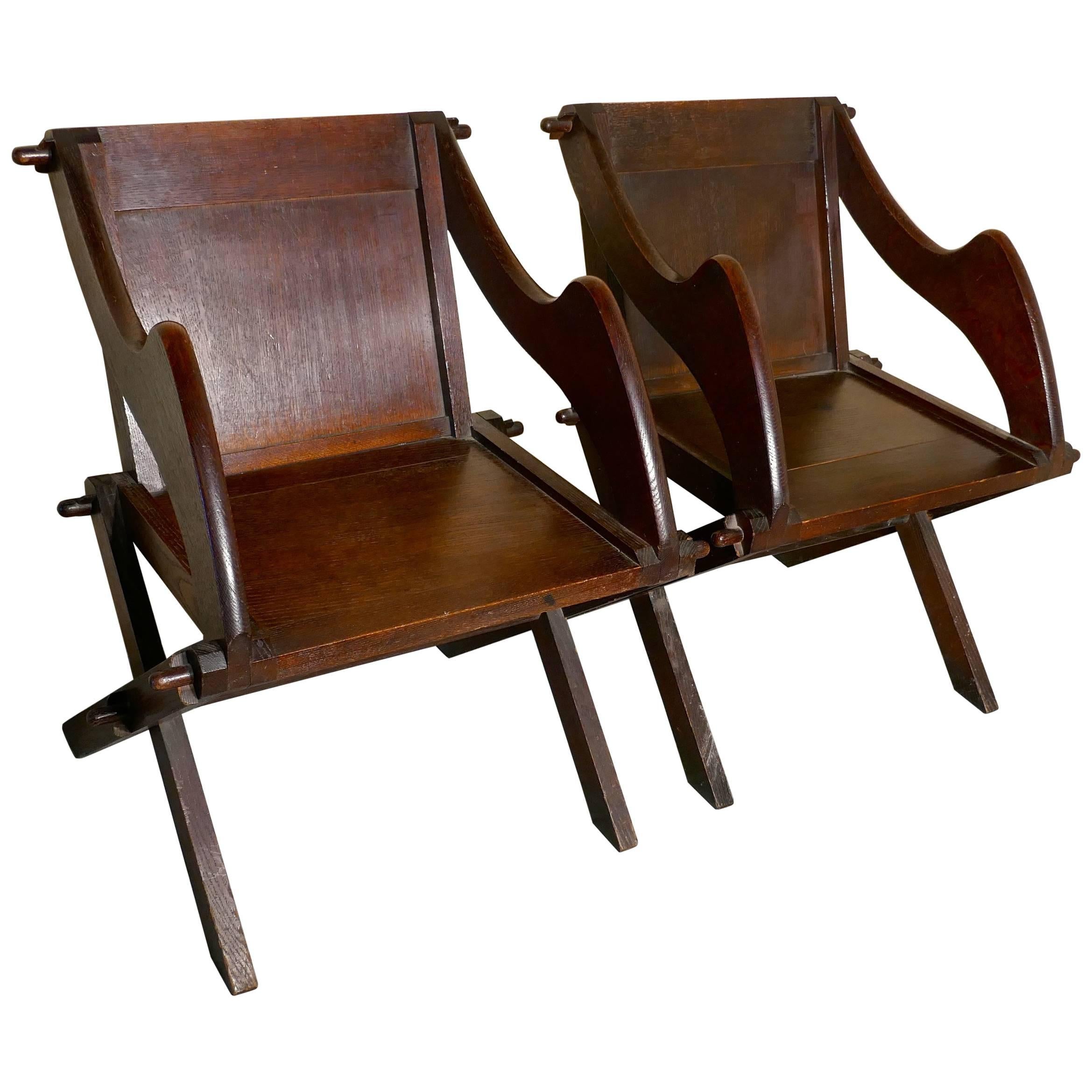 Pair of 19th Century Glastonbury Chairs in Oak For Sale