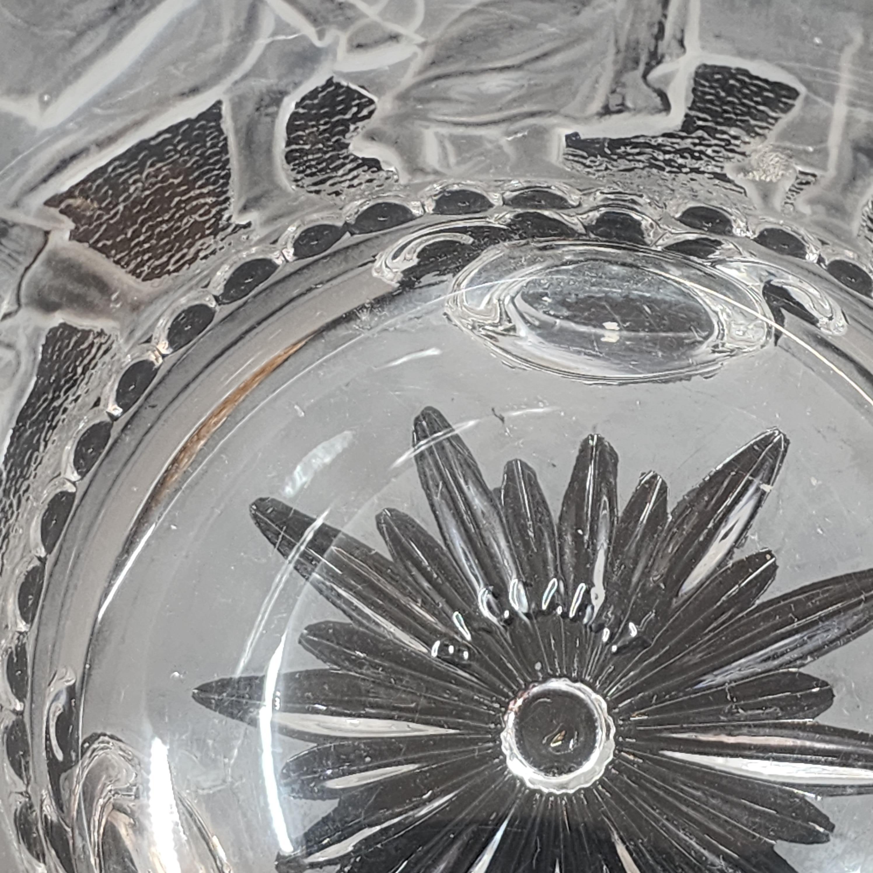 Pair of Neoclassical grand tour style footed cache pots in clear and frosted crystal by Baccarat circa 1880. Founded in 1816, Baccarat is a French crystalware maker that is most well-known for its luxury lead crystal designs.