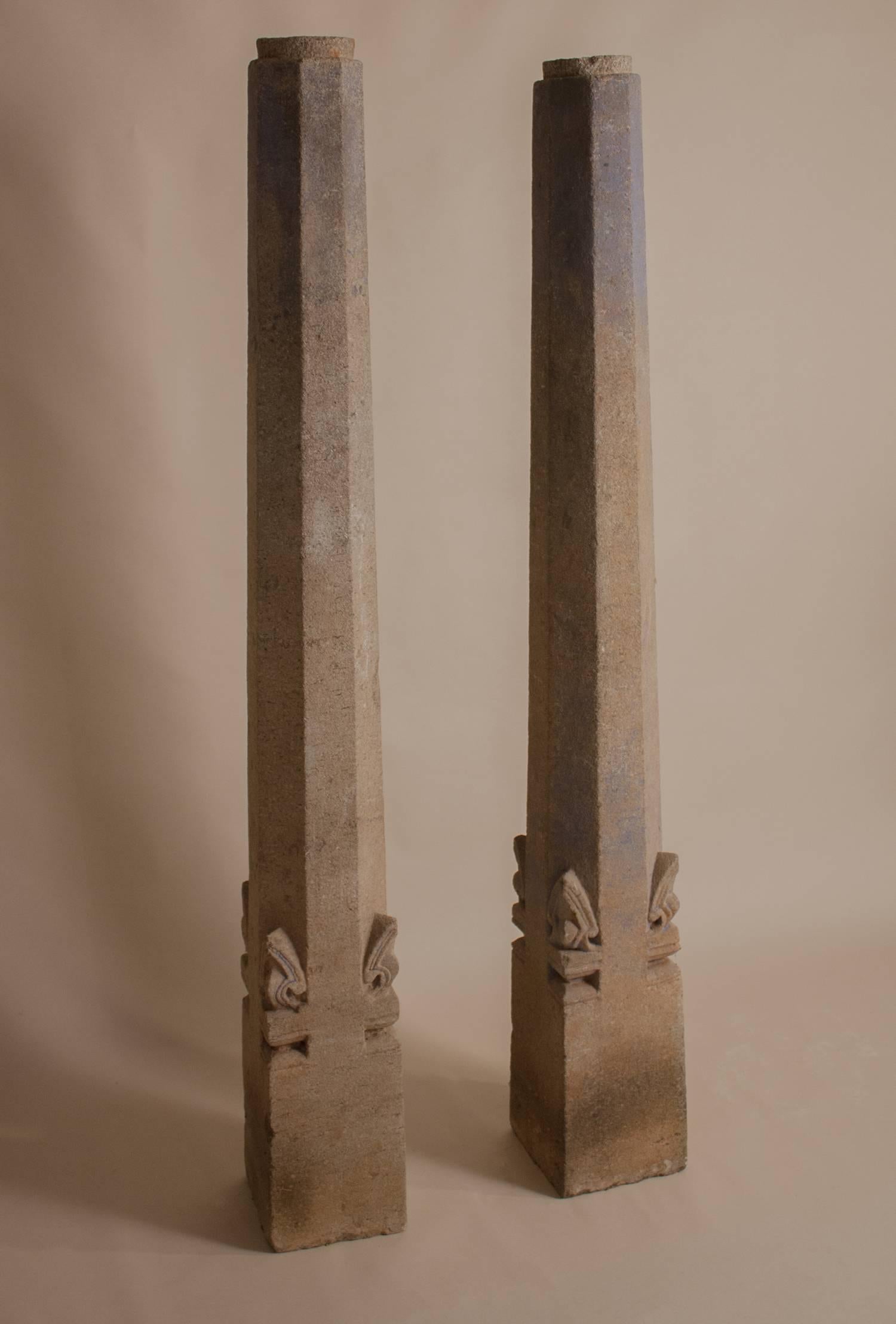 These granite octagonal pillars are from the Blue City on the edge of the Thar Desert in Jodphur, India. Simple and organic, the stone columns have retained traces of their original indigo blue paint. At 5 feet 4 inches tall, interior and landscape