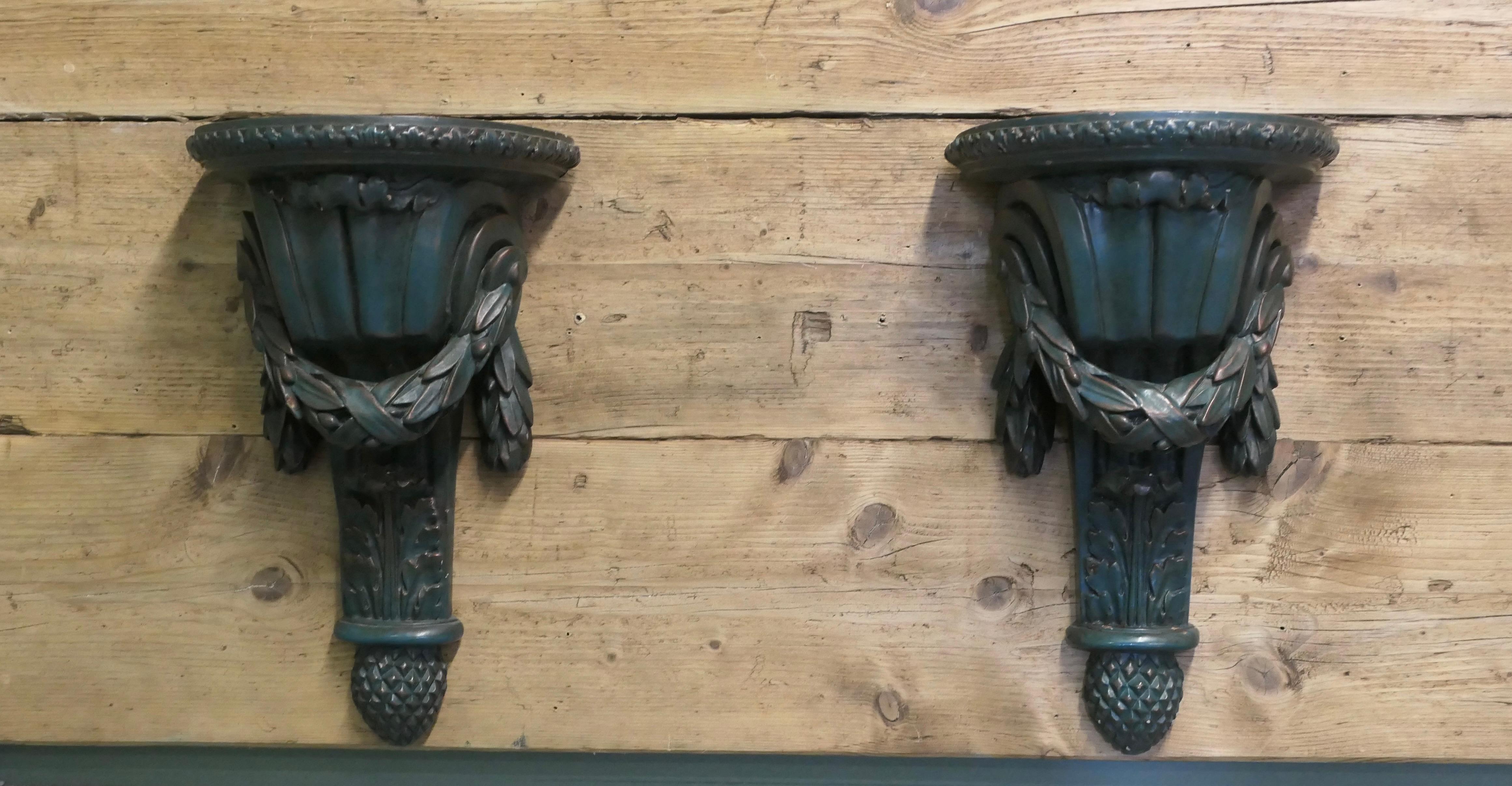 Pair of 19th Century Green Wall Brackets
   
These are beautifully designed pieces, they are in a classical style and painted in a very dark green, they could be used as wall brackets or shelves 
The brackets are in good condition and very
