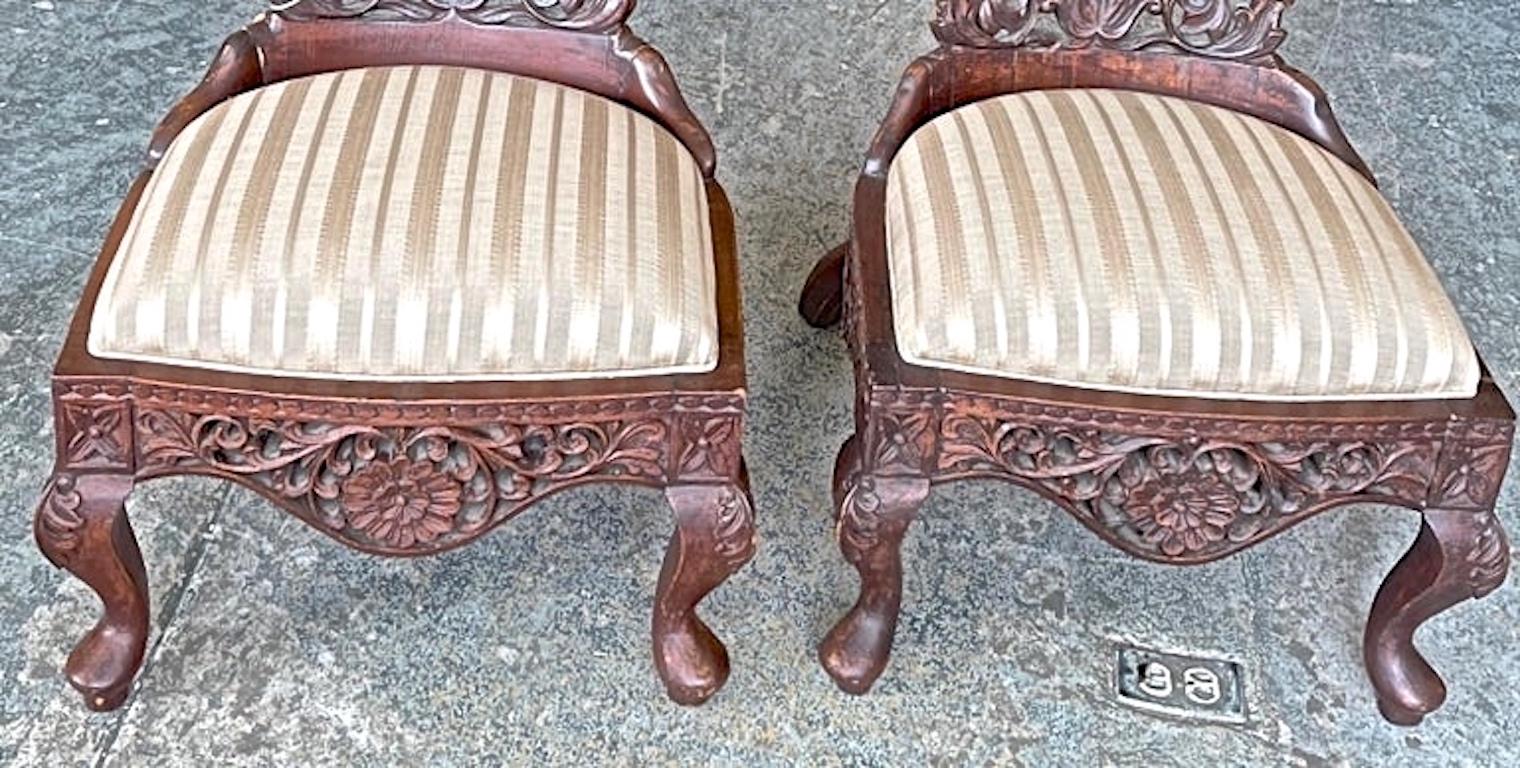 Pair of 19th Century Hand Carved Burmese Nursing Chairs with Silk Covered Seats For Sale 7