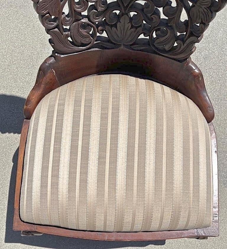 Pair of 19th Century Hand Carved Burmese Nursing Chairs with Silk Covered Seats 8