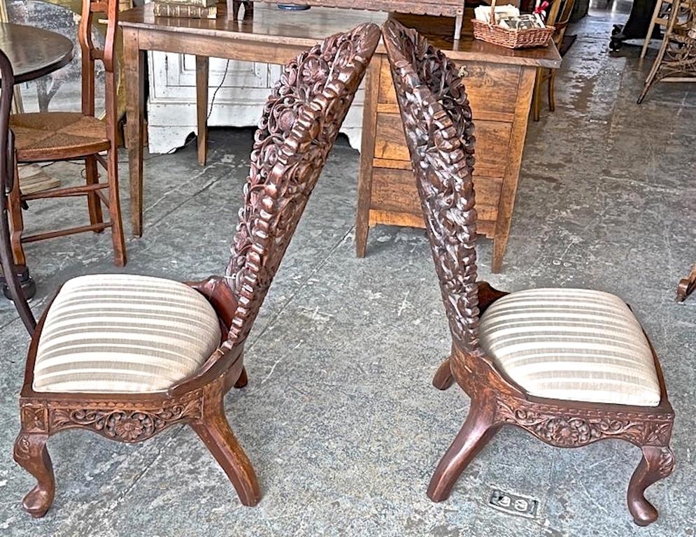 Pair of 19th Century Hand Carved Burmese Nursing Chairs with Silk Covered Seats For Sale 1