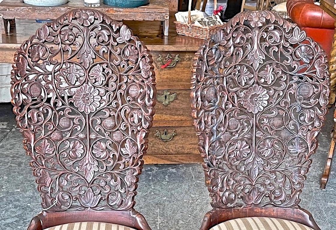 Pair of 19th Century Hand Carved Burmese Nursing Chairs with Silk Covered Seats For Sale 2