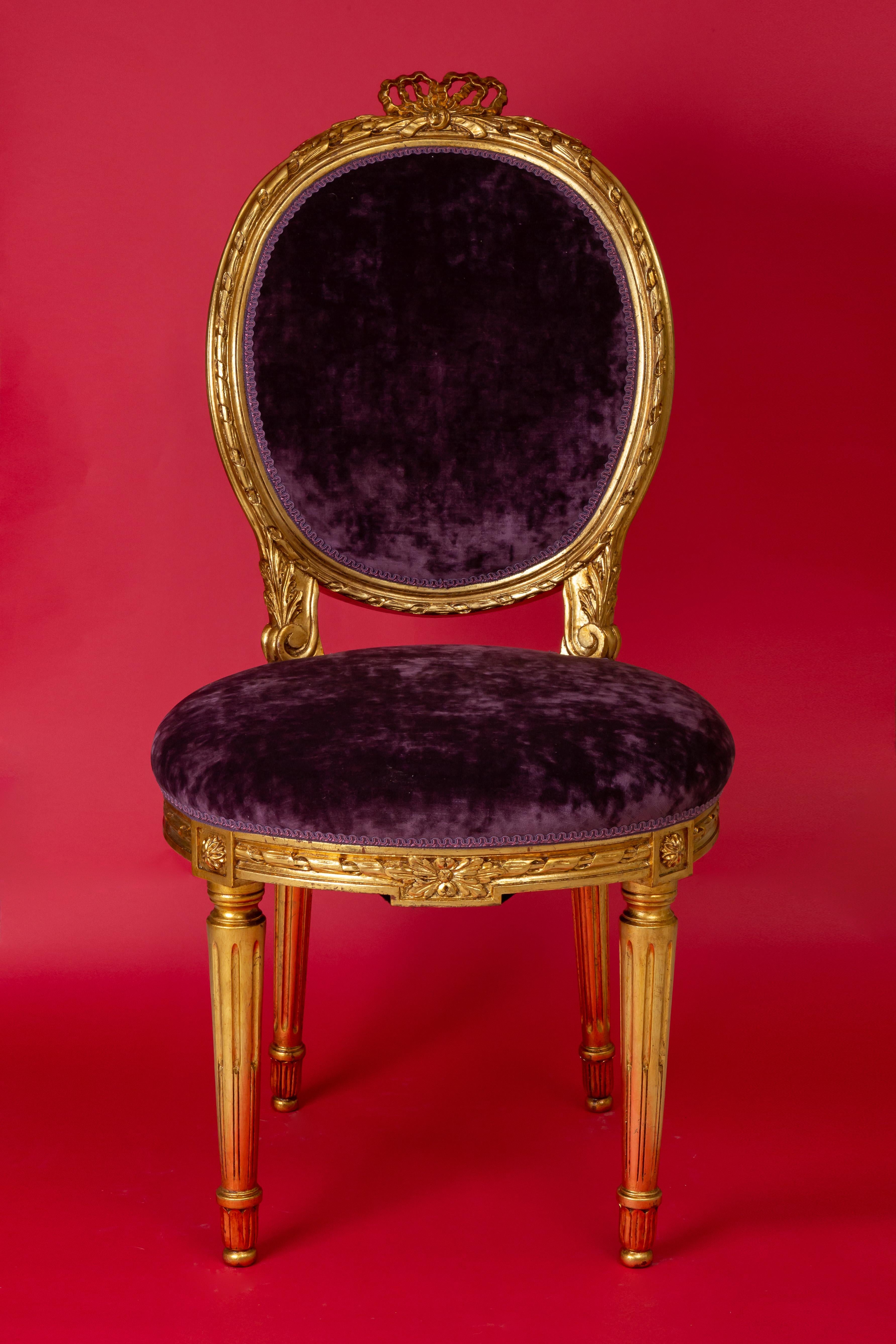 Original hand carved wood frame from the 19th century, round shape newly gilded with 24-karat gold leaves
Newly upholstered with elegant and luxurious deep purple velvet
Measures: Height 101 cm, width 50 cm, depth 51 cm.
Wear consistent with age and