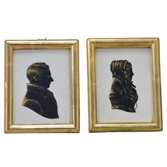 Paire de silhouettes de portraits en papier découpé à la main du 19e siècle