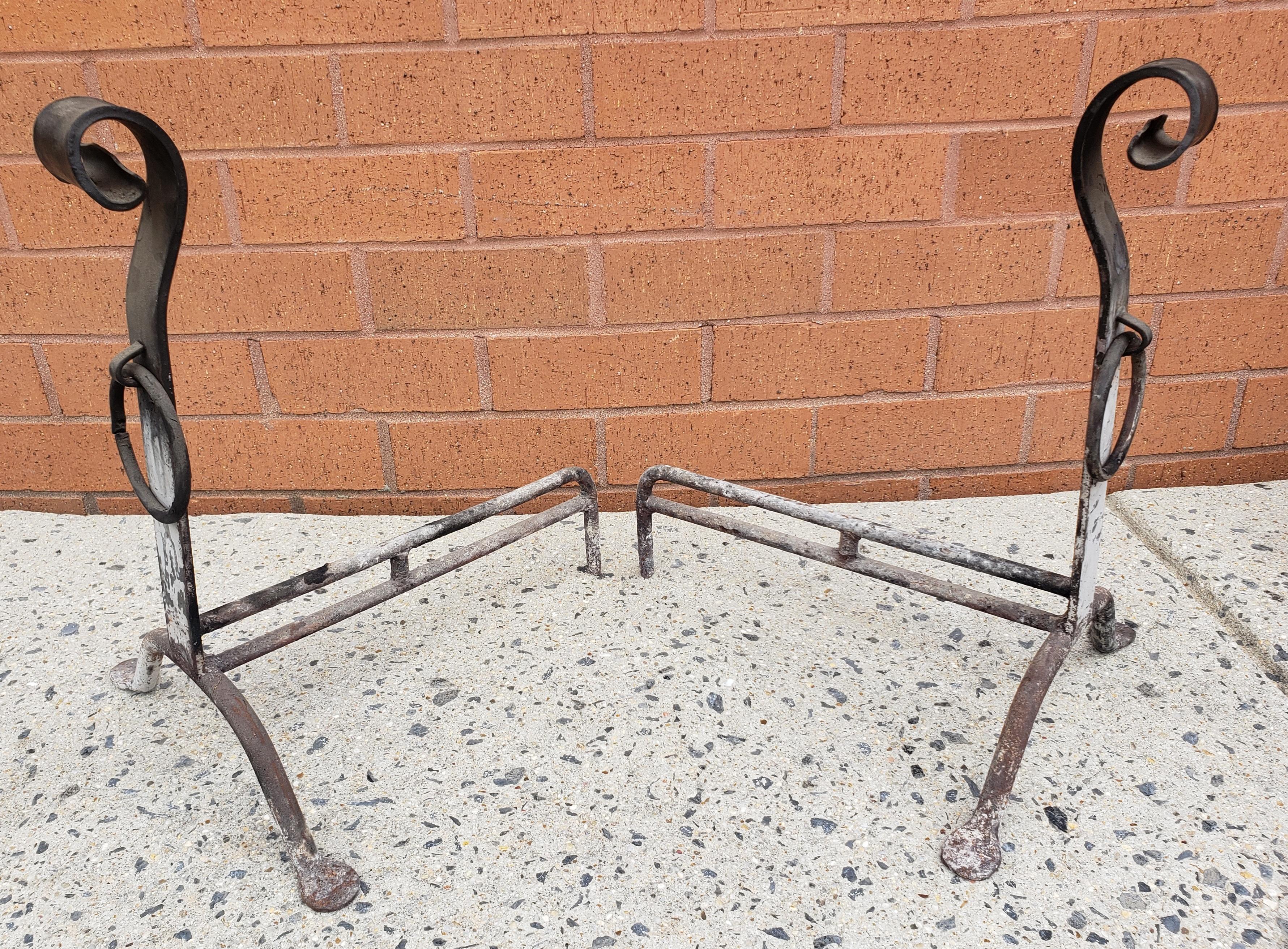 Pair of 19th Century Hand Forged Iron Andirons. Meaures 12