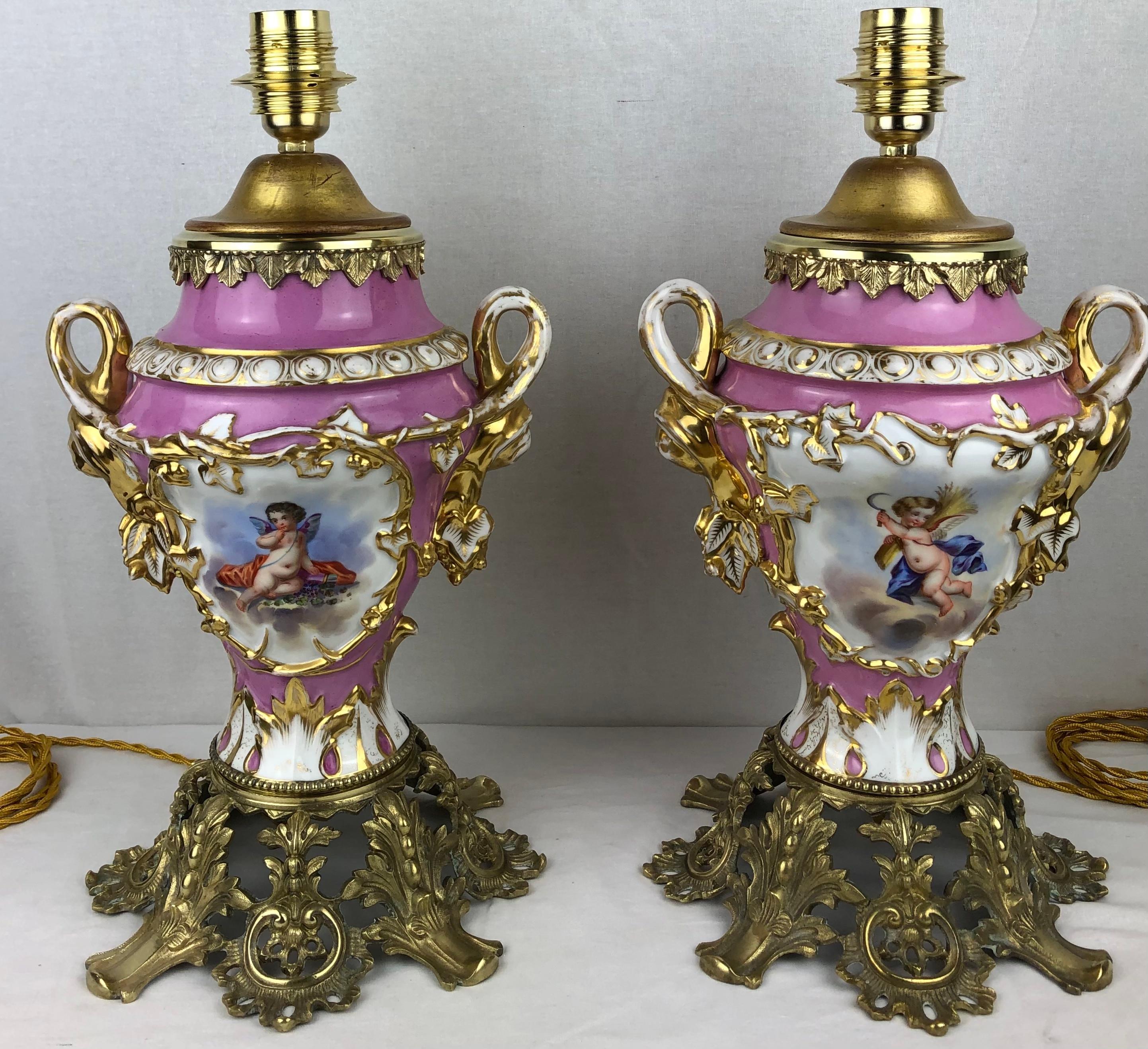 Pair of fine quality 19th Century Louis XVI style Sevres porcelain ormolu mounted table lamps. Traditional French porcelain. 

These beautiful hand-crafted, hand-painted Porcelain de Sevres table lamps are stunning. One side is painted with cherubs