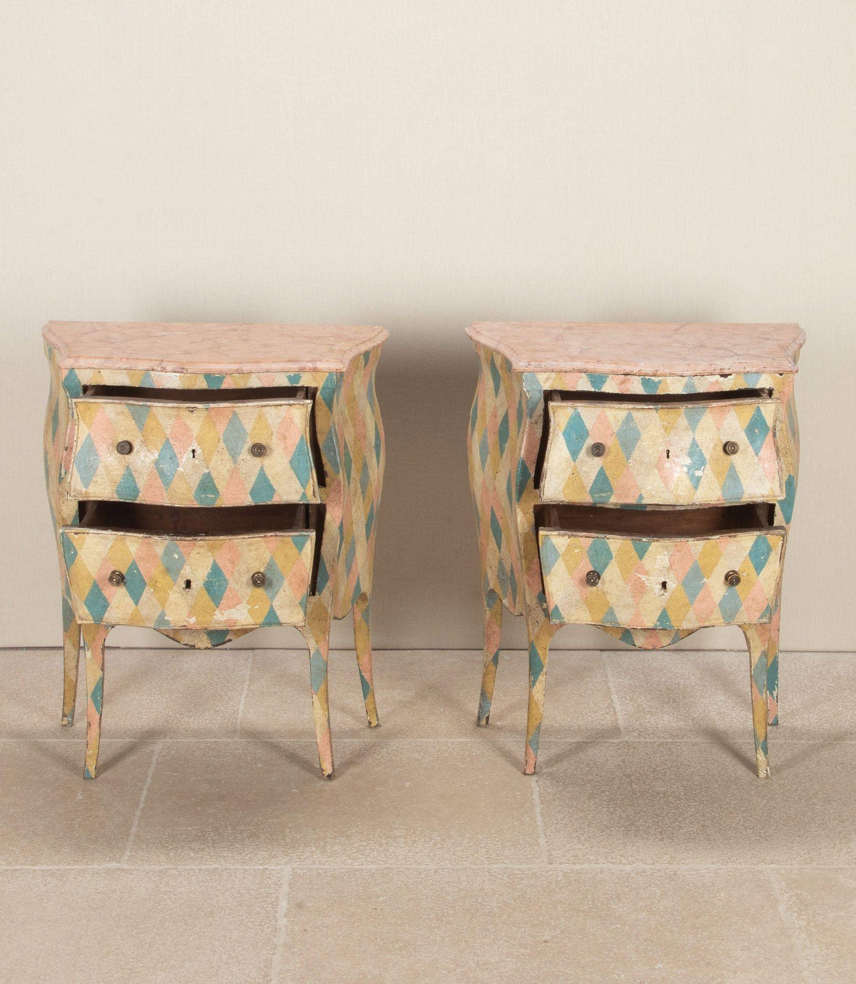 Pair of 19th Century Italian hand painted bedside bombe commodes.
Each two drawer commode has a shaped pink marble top, brass fittings and later hand painted harlequin design.
Circa 1890.