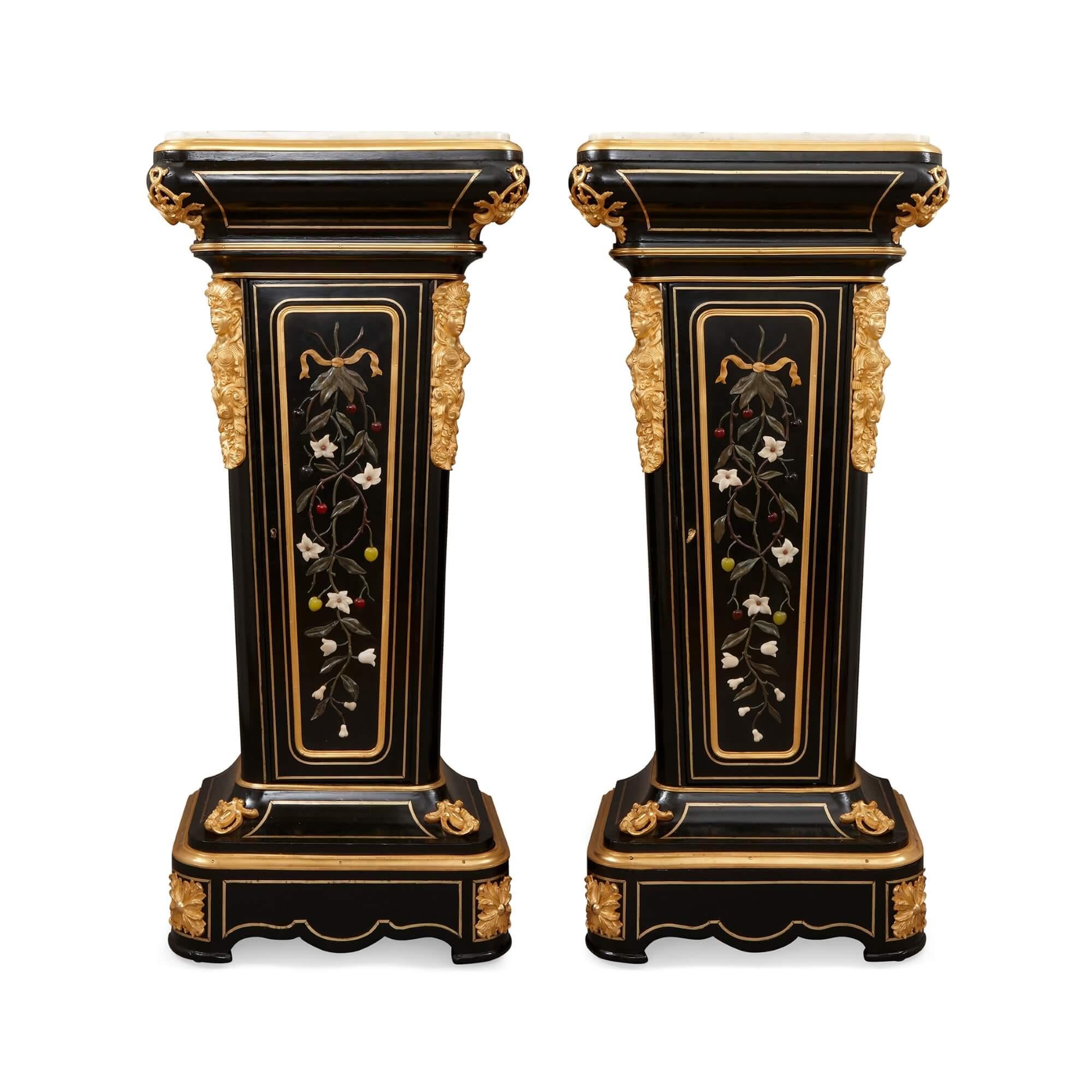 Pair of 19th century hardstone, ormolu and ebonised wood pedestal cabinets
French, 19th Century
Height 138cm, width 64cm, depth 43cm

Originating from the artistic milieu of 19th century France, this pair of pedestal cabinets showcase the era's