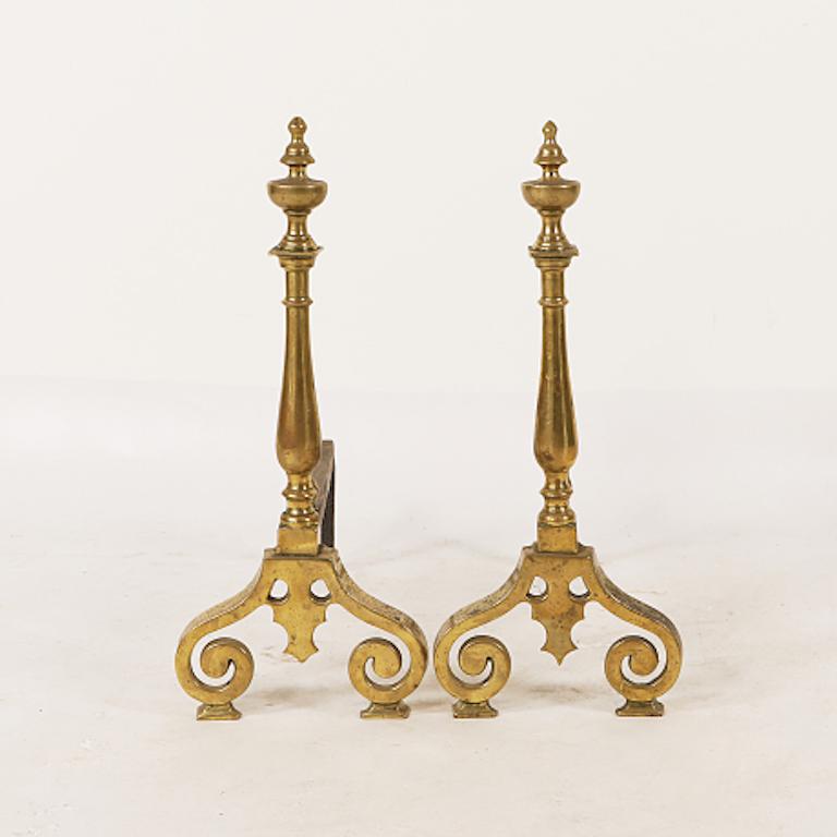 This beautiful pair of 19th Century brass & iron fire dogs are approximately 23 inches high, and 21.5 inches long.
  
  