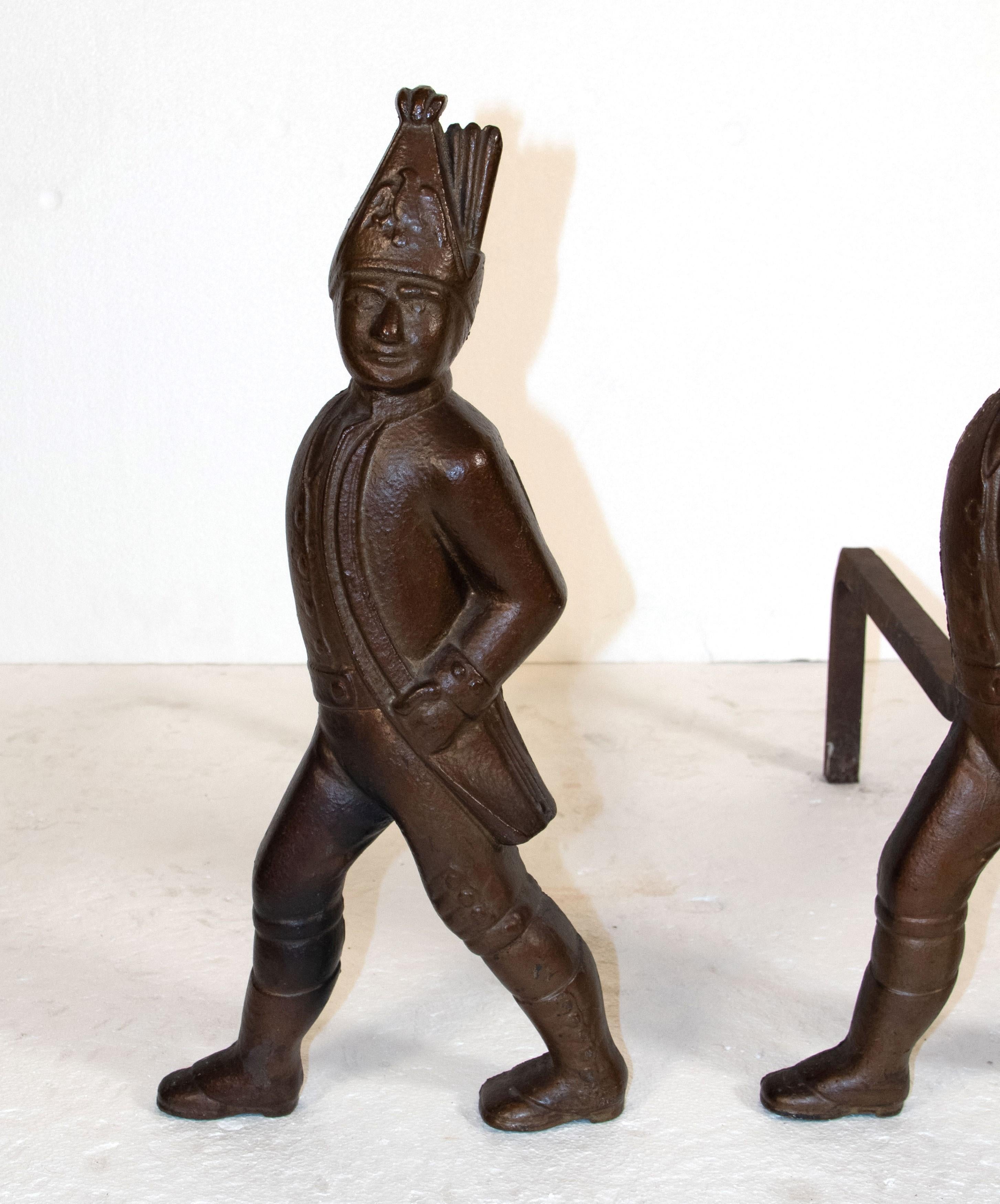 Pair of antique andirons depicting Hessian soldiers in a cast iron construction. Good condition with appropriate wear from age. Priced as a pair. Please note, this item is located in one of our NYC locations.