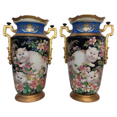 Pair of 19th Century highly decorative Parisian vases