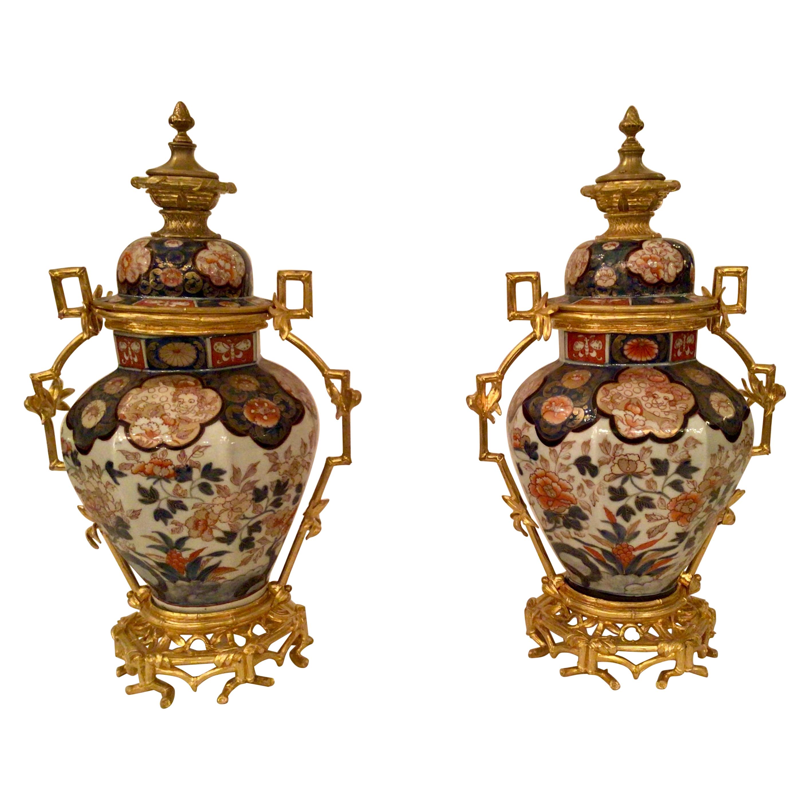Pair of 19th Century Imari Porcelain and Ormolu Mounted Urns, circa 1840-1860