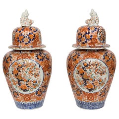 Pair of 19th Century Imari Urns with Lids with Floral Design