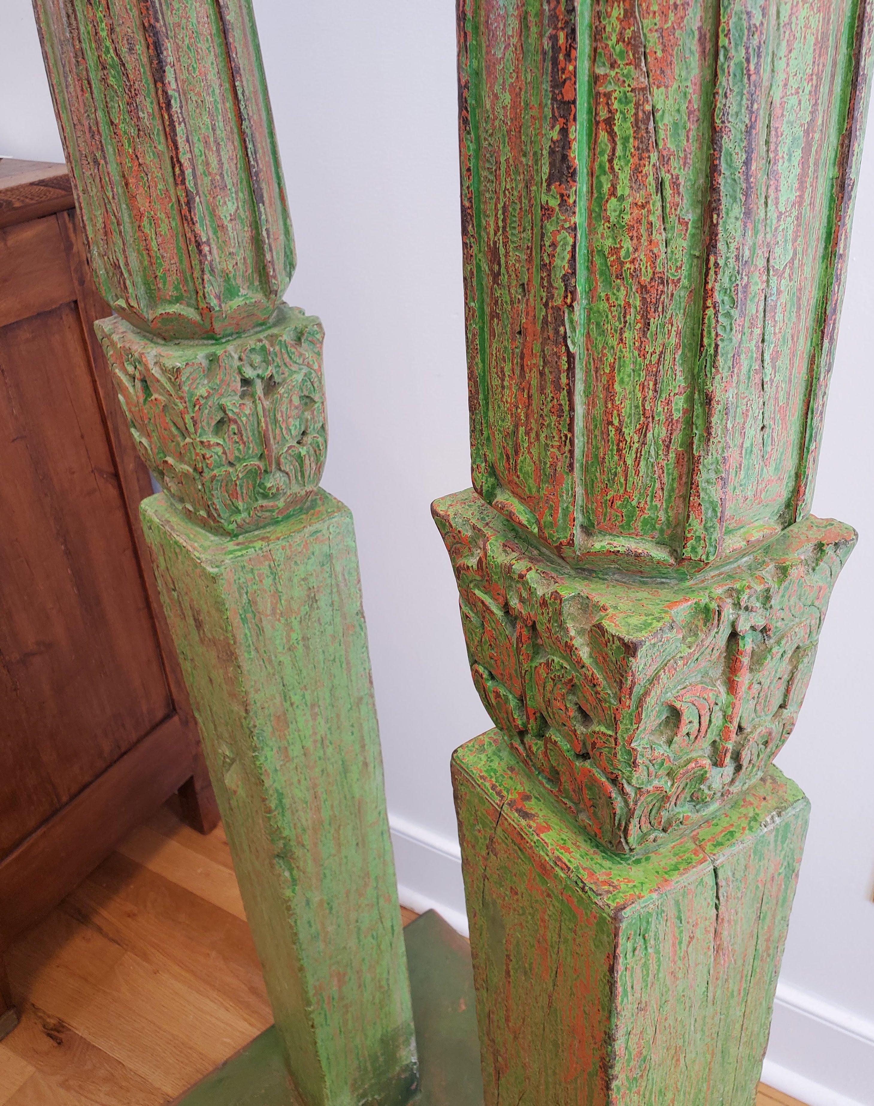 Rustic Pair of 19th Century Indonesian Carved Green and Red Painted Teak Columns