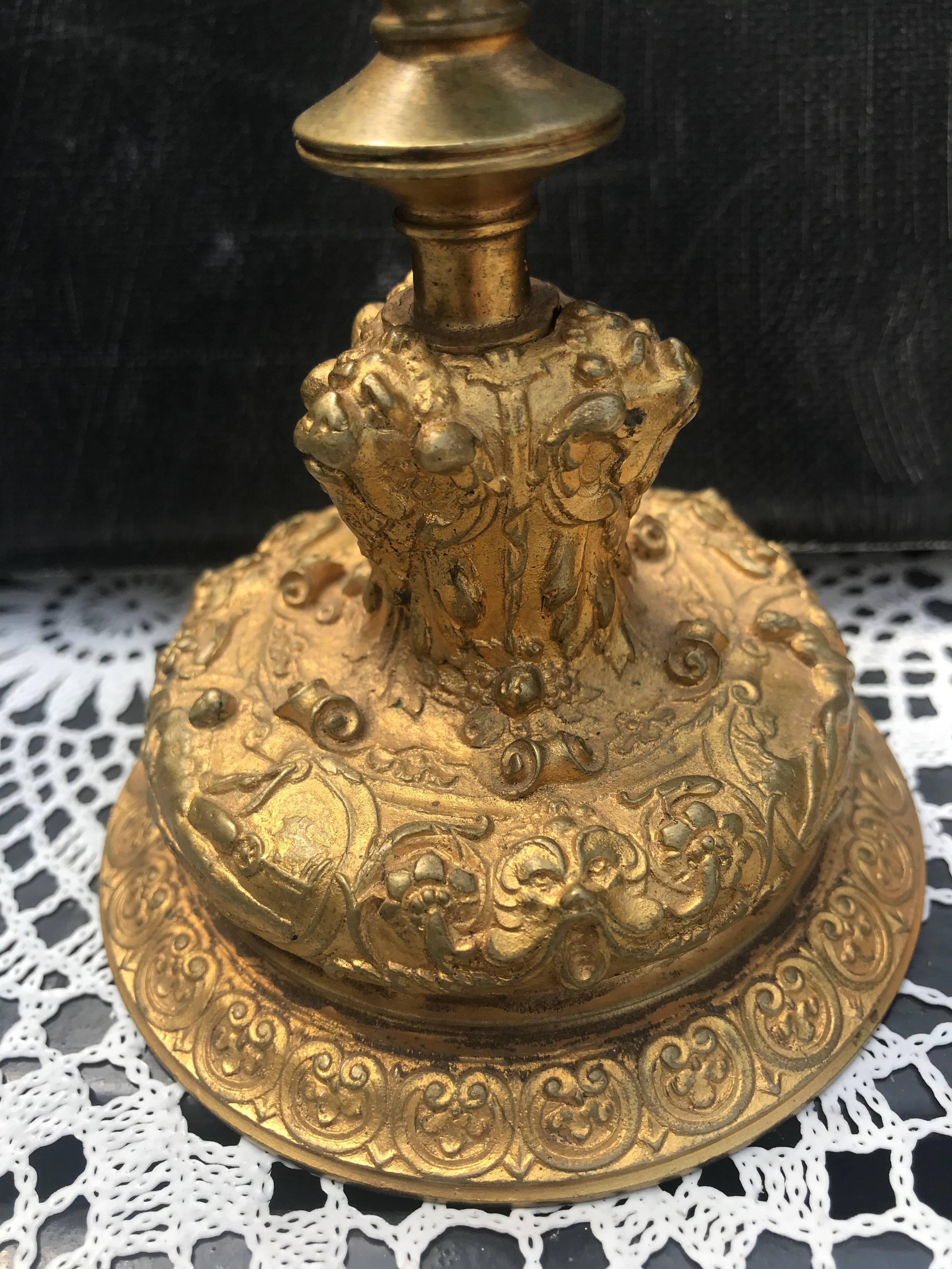Practical size and highly decorative bronze candleholders. 

If you are looking for a rare pair of antique, fine bronze candle holders than this attractive and highly decorative pair could be flying your way soon. The work that has gone into