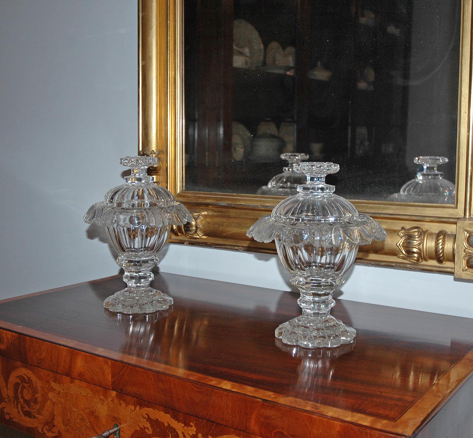 An exceptional pair of lidded cut-crystal sweetmeat jars or compotes. 
Ireland, circa 1825. Perfect over a mantel, sideboard or for use as centerpieces.
Measures: 8