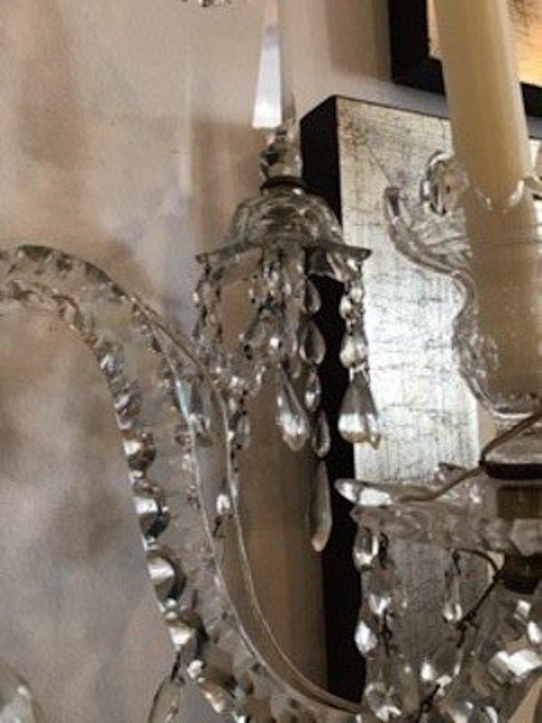 Pair fo cut crystal Irish Georgian wall sconces or lights. Two arms each with large spike topped with a cut neoclassical urn. Large and wonderful.