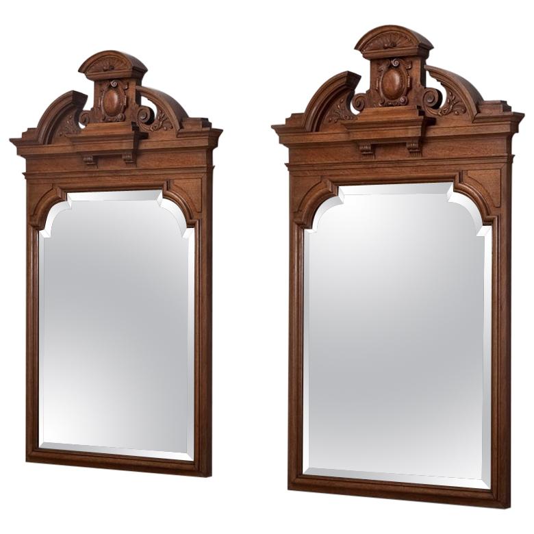Pair of 19th Century Irish Neoclassical Carved Walnut Mirrors