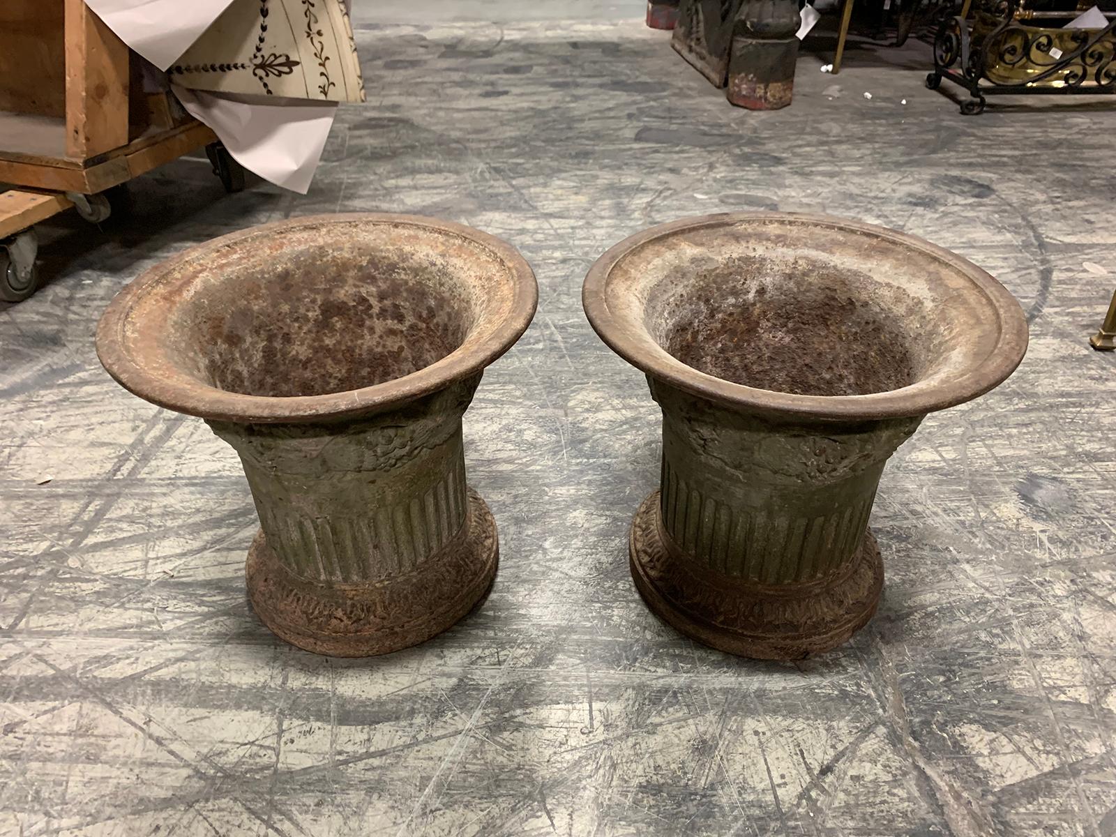 Pair of 19th Century Iron Directoire Garden Planters Fluted with Leaf Detail In Good Condition For Sale In Atlanta, GA