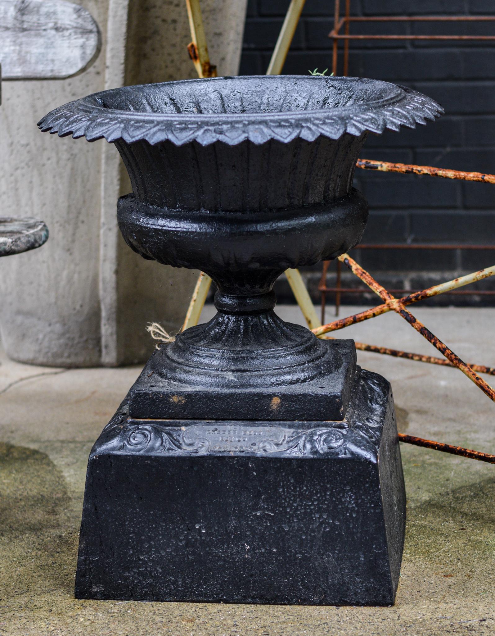 American Pair of 19th Century Iron Urns