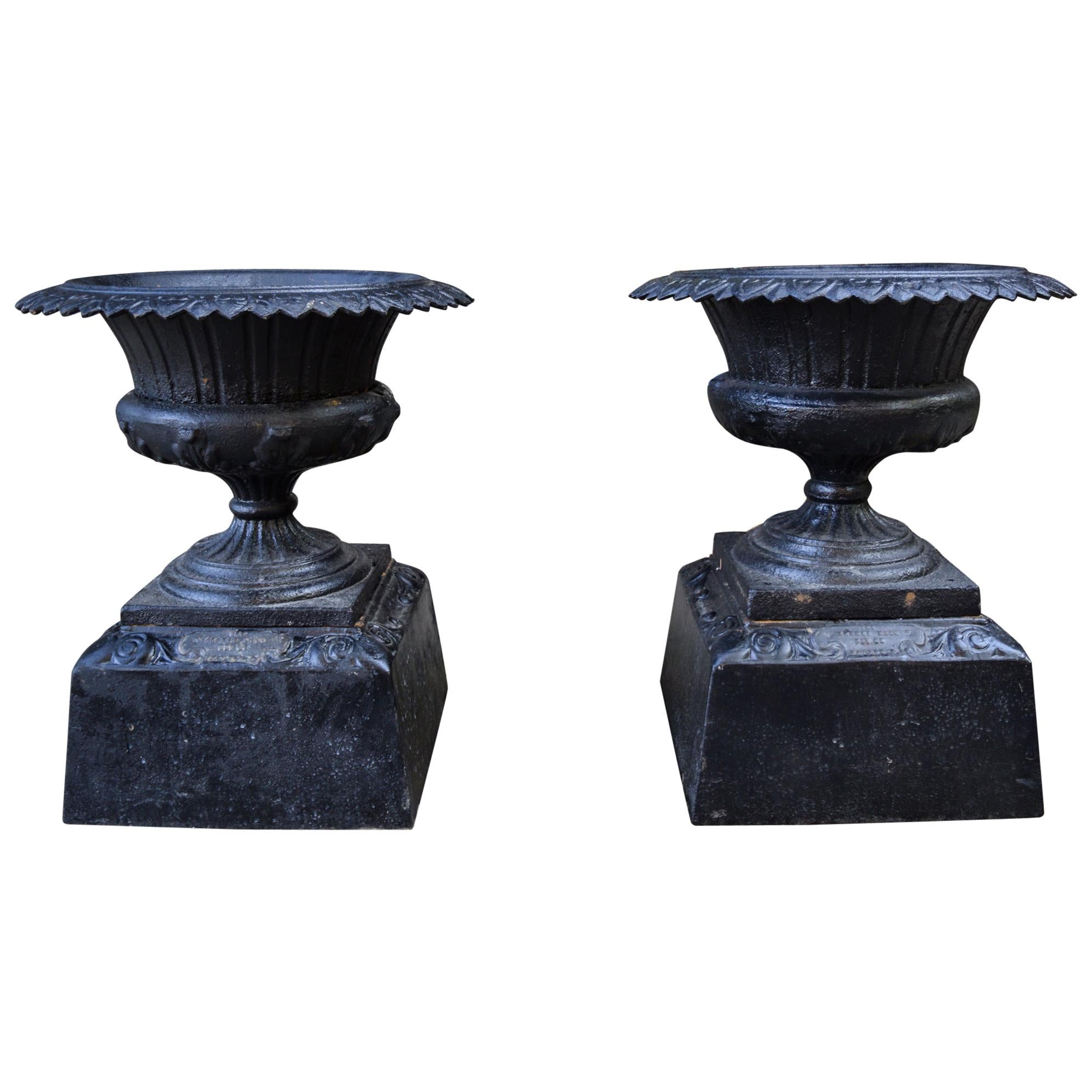 Pair of 19th Century Iron Urns