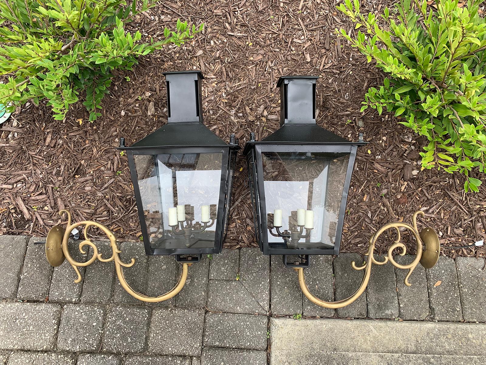 Pair of 19th century iron wall-mount lanterns by Louis Sepulchre, Labeled, circa 1880
Three lights
Brand new wiring.