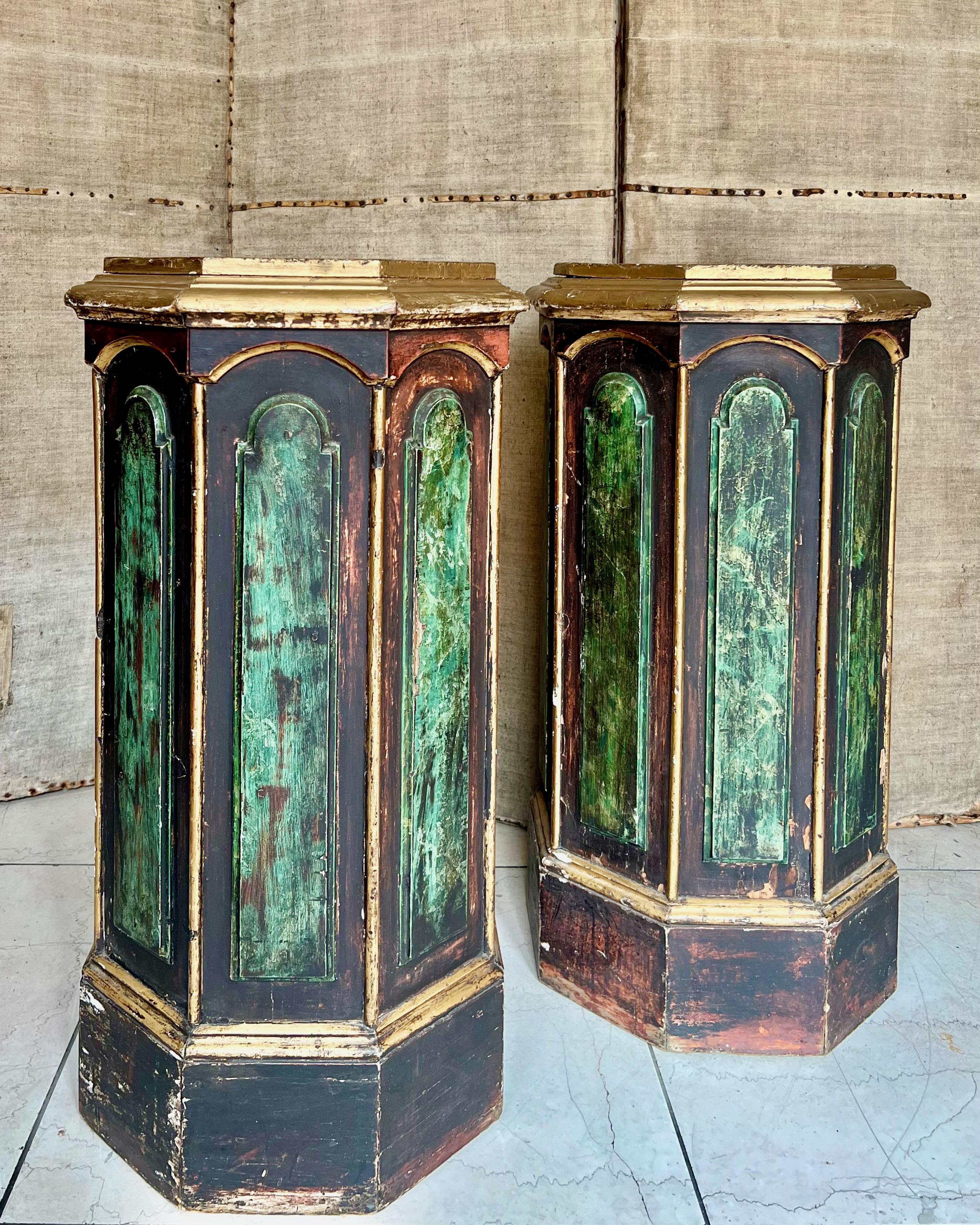 Pair of 19th century bust stands/pedestals/columns - painted, decorative paneled with molded tops and sides in octagon shape. Painted in decorative marble trompe l'oeil effect with gold trim accented.
Rare find - a great size for busts, art objects,